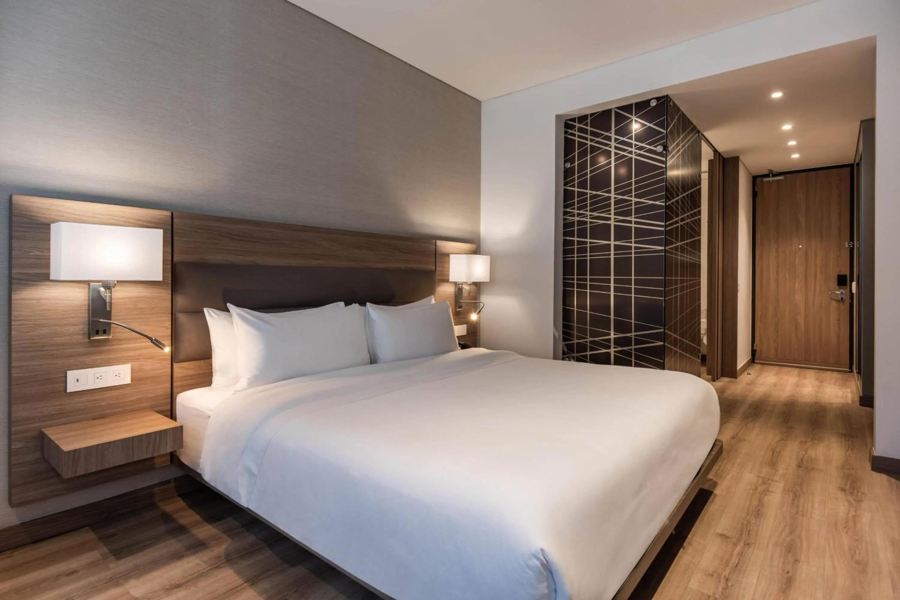 Photo of the whole room, Bed in AC Hotel by Marriott Bogota Zona T