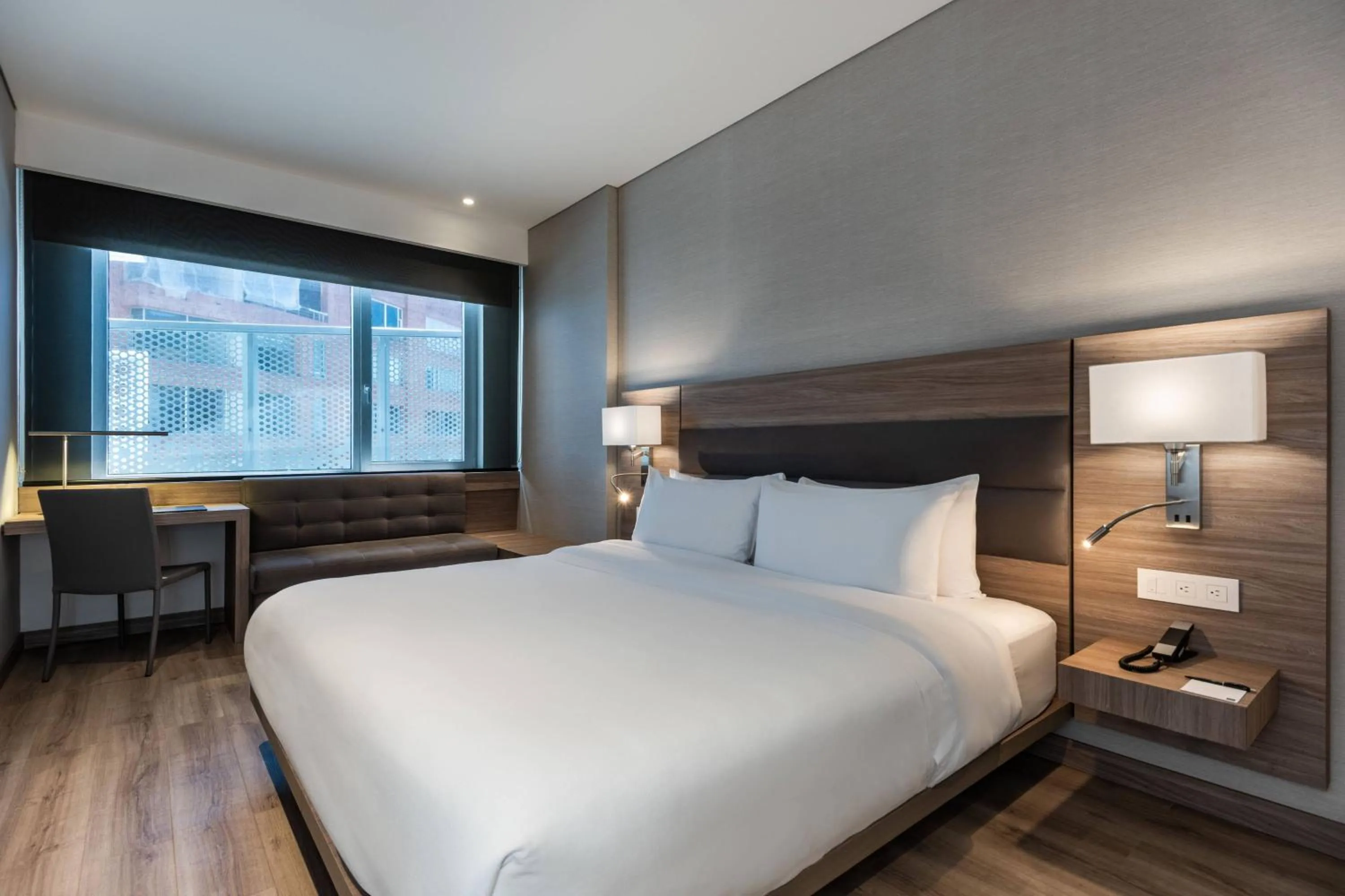 Photo of the whole room, Bed in AC Hotel by Marriott Bogota Zona T