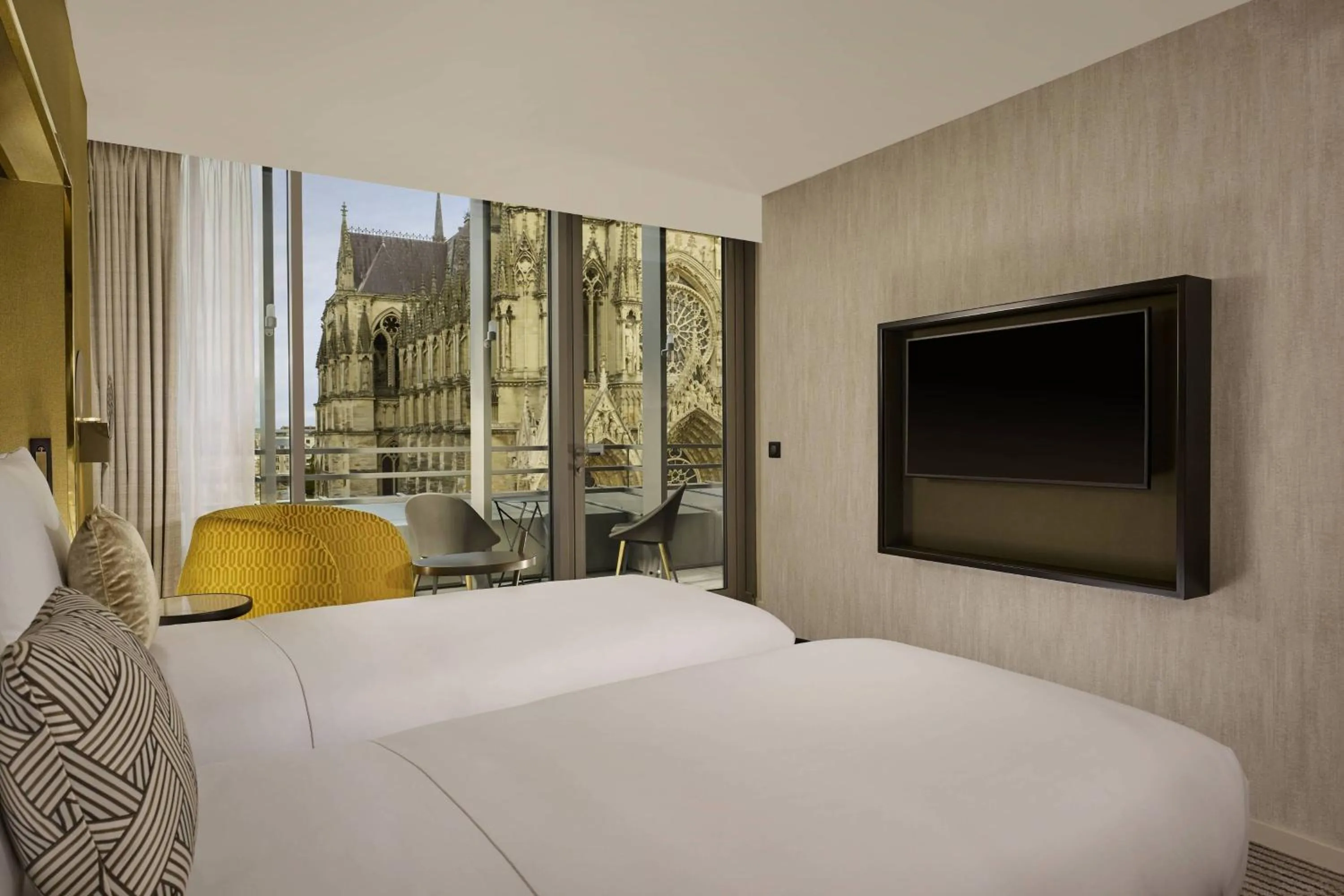 Photo of the whole room, Bed in La Caserne Chanzy Hotel & Spa, Autograph Collection