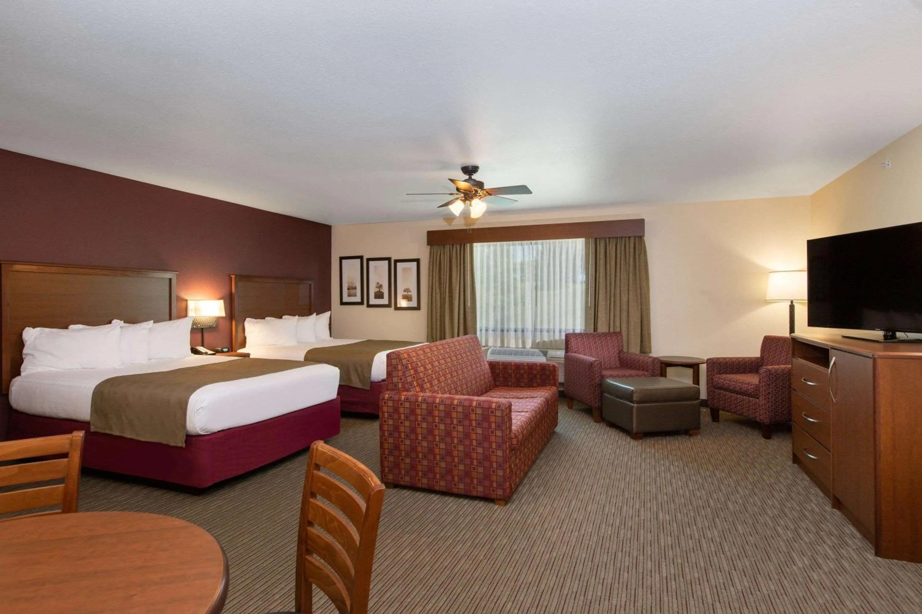 Photo of the whole room, Bed in AmericInn by Wyndham Merrill