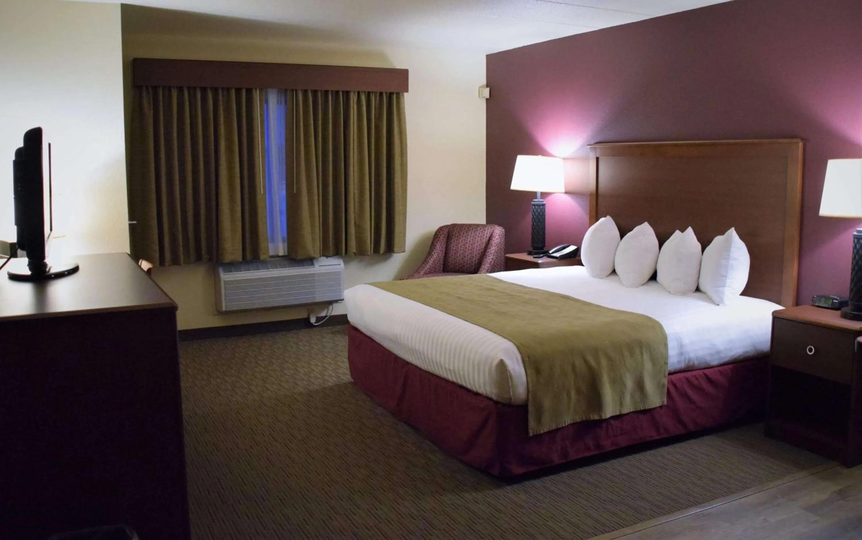 Photo of the whole room, Bed in AmericInn by Wyndham Merrill