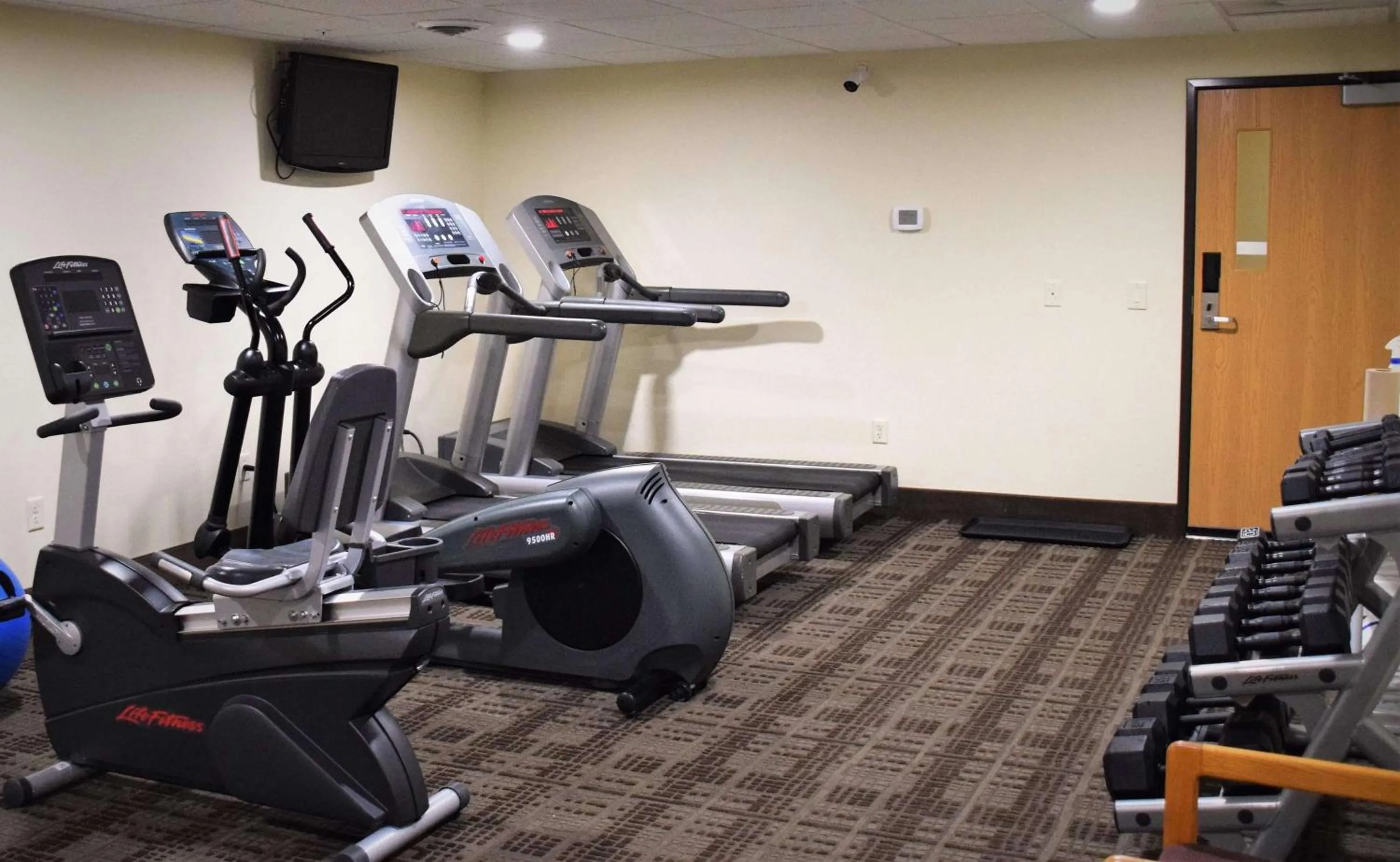 Fitness centre/facilities in AmericInn by Wyndham Merrill