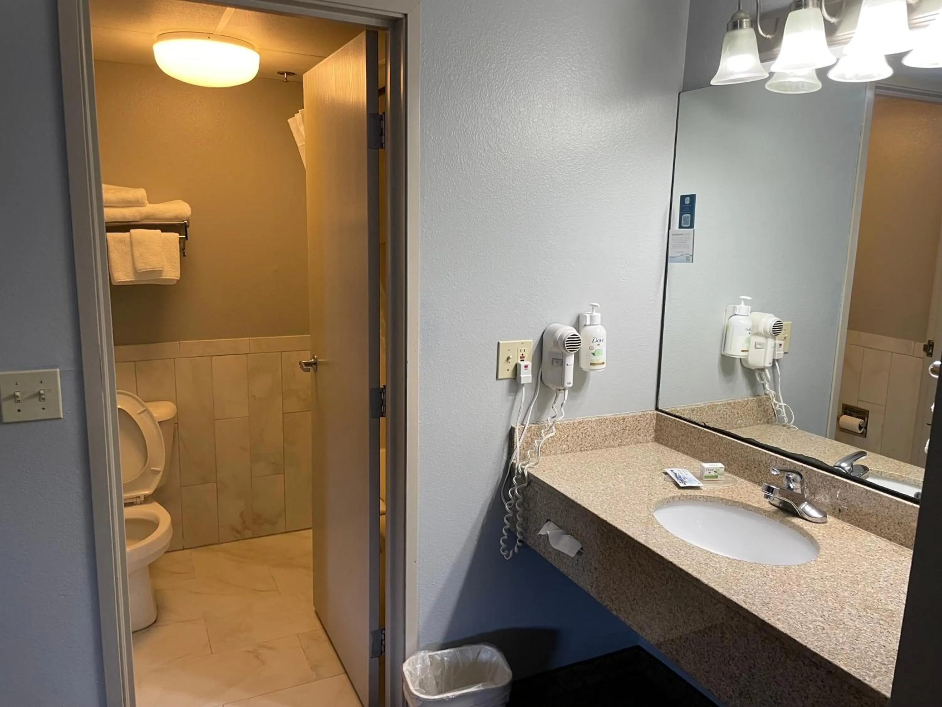 Bathroom in AmericInn by Wyndham Hartford WI