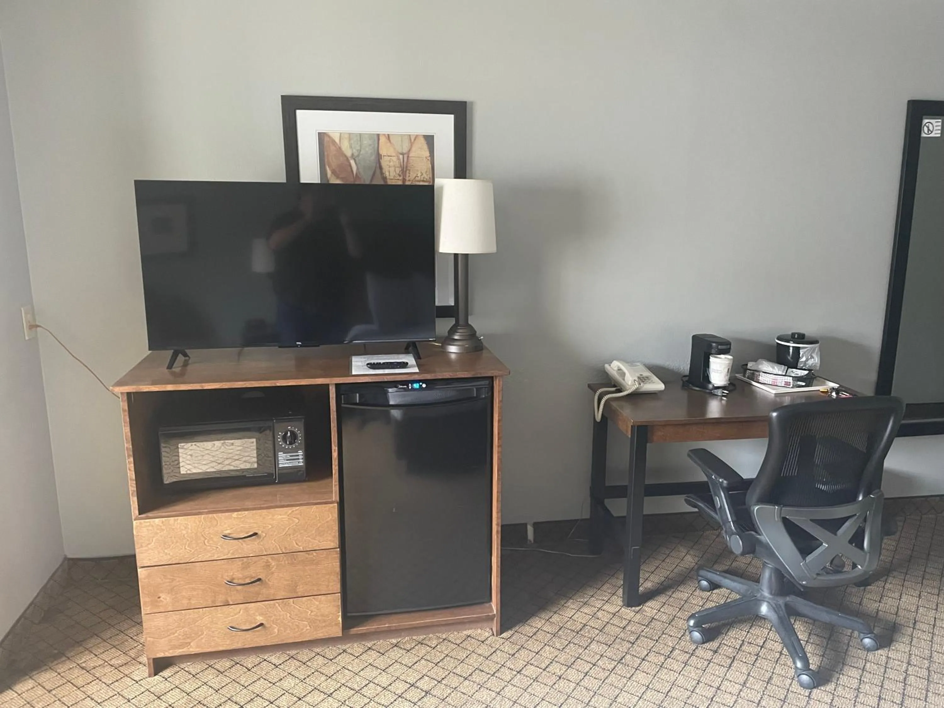 TV and multimedia in AmericInn by Wyndham Hartford WI