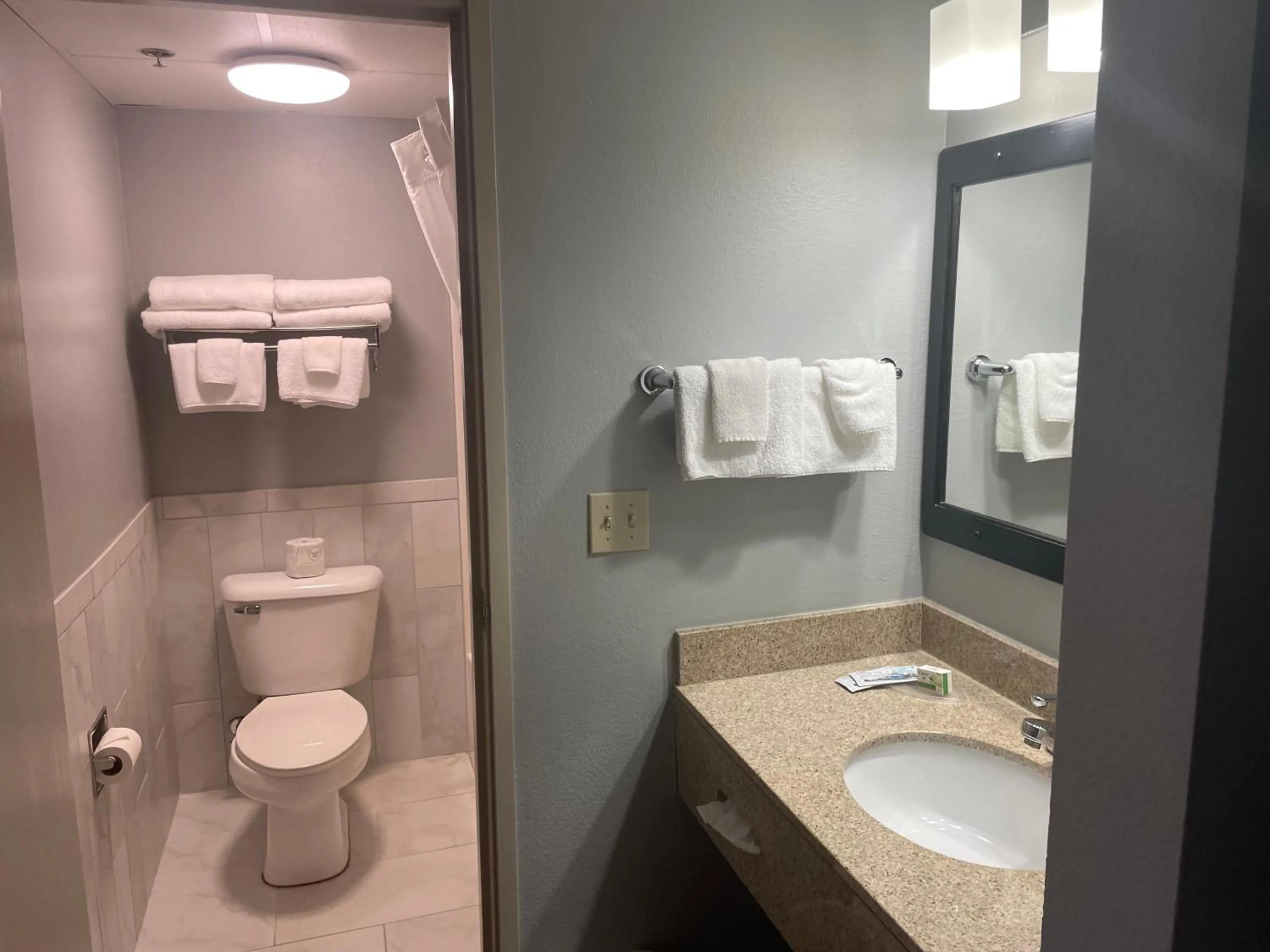 Bathroom in AmericInn by Wyndham Hartford WI