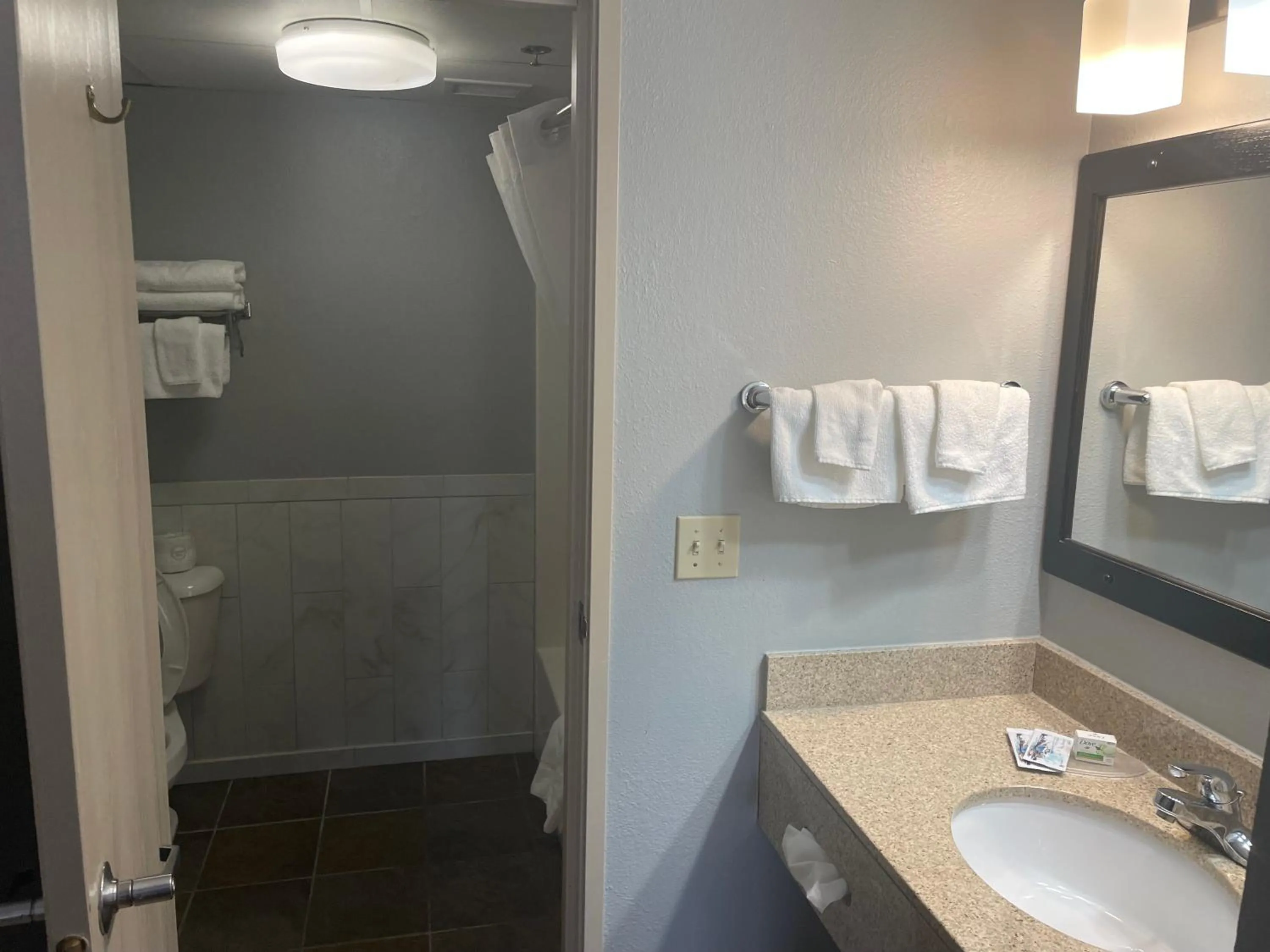 Bathroom in AmericInn by Wyndham Hartford WI