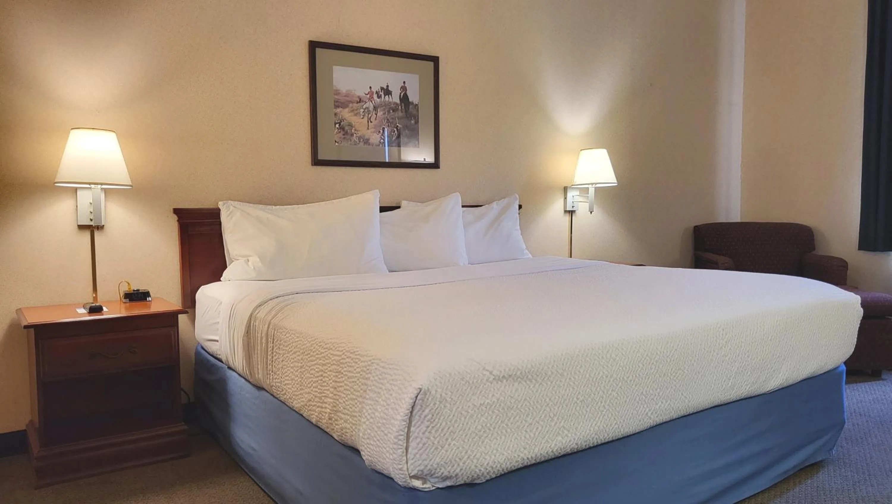 Photo of the whole room, Bed in Magnuson Hotel West Liberty