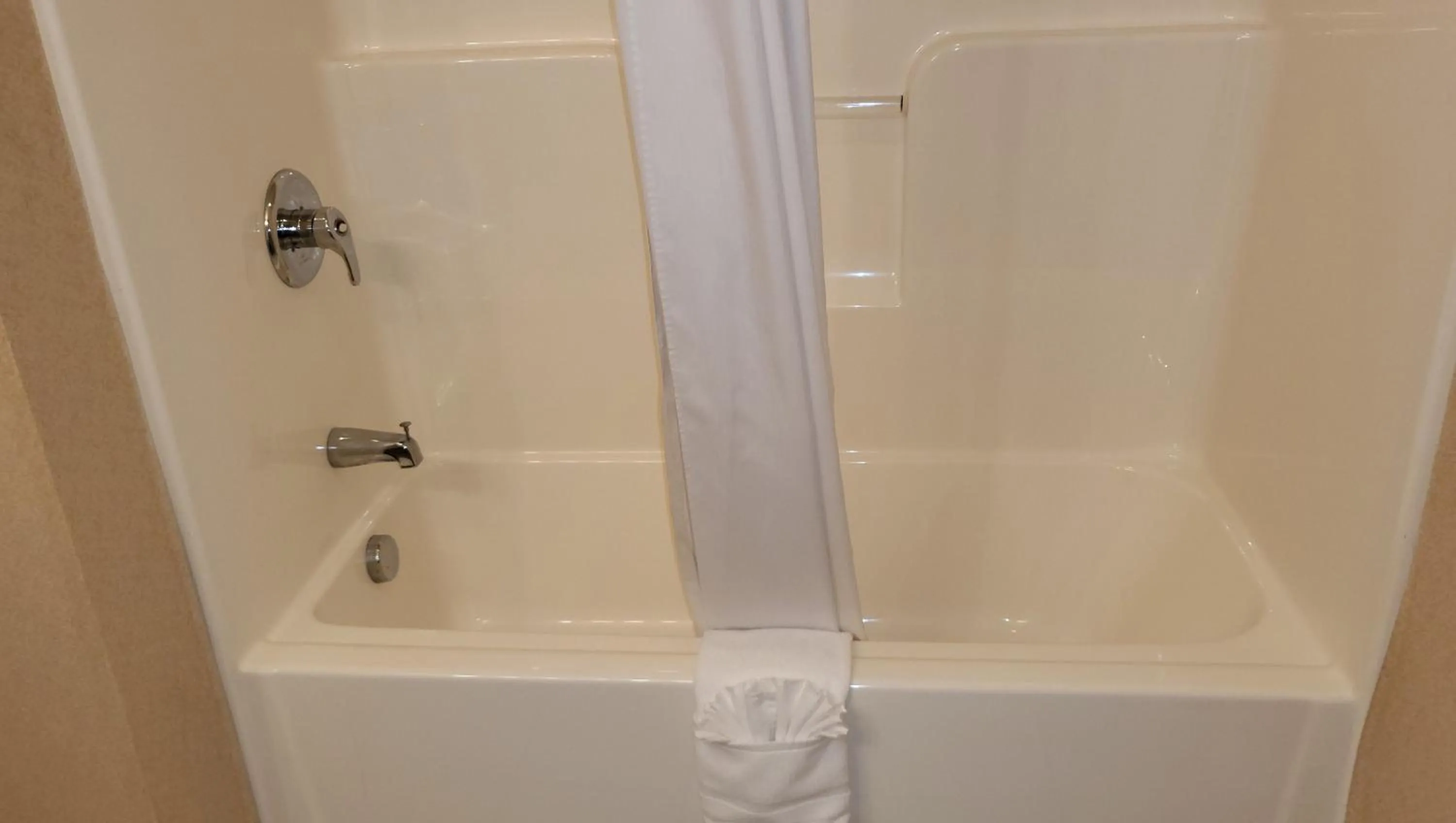 Bathroom in Magnuson Hotel West Liberty