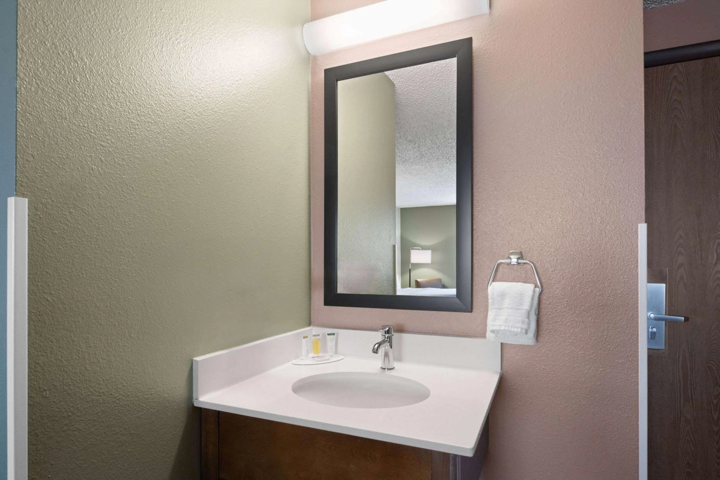 Bathroom in Super 8 by Wyndham Conrad