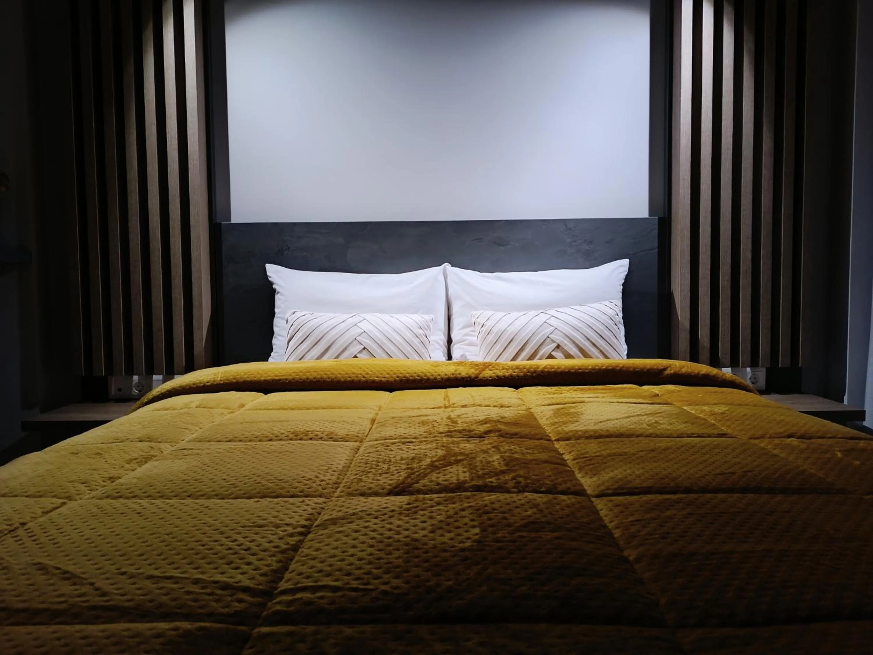 Bed in Elizabeth Queen Luxury Rooms