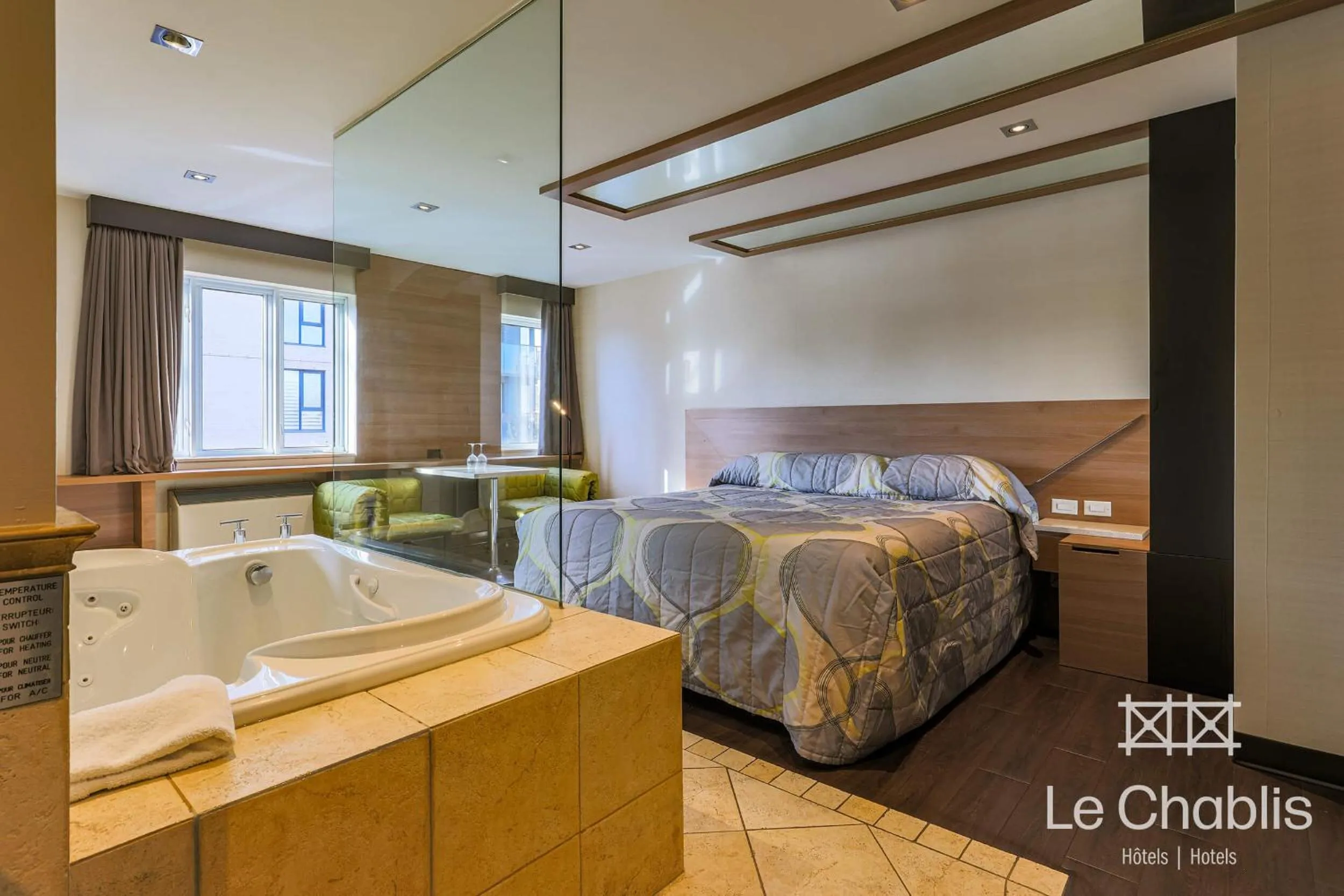 Bed in Hotel Le Chablis Cadillac