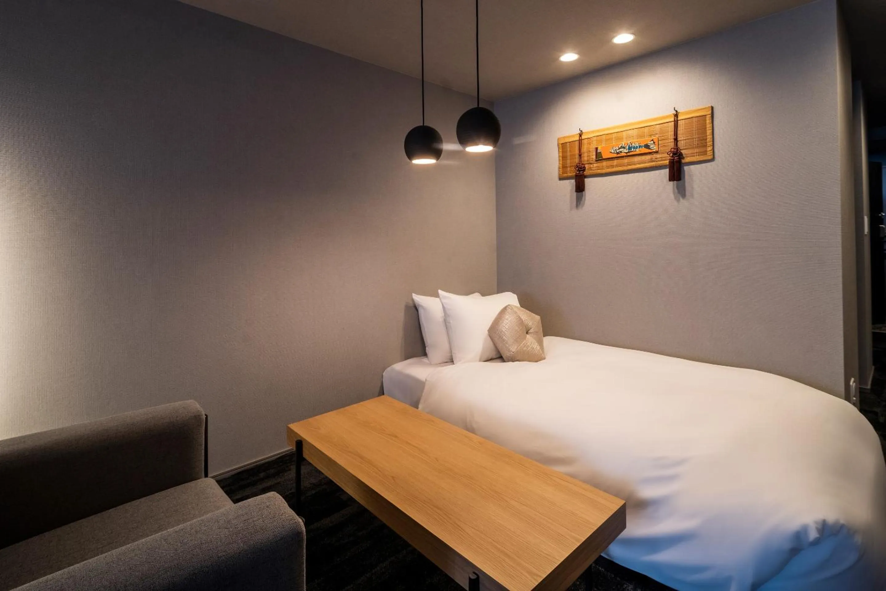 Bed in RESI STAY Mayu Grace Hotel