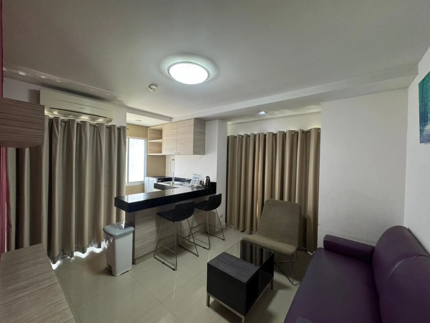 Seating area in Palette Bella B All Suites Bangkok Hotel