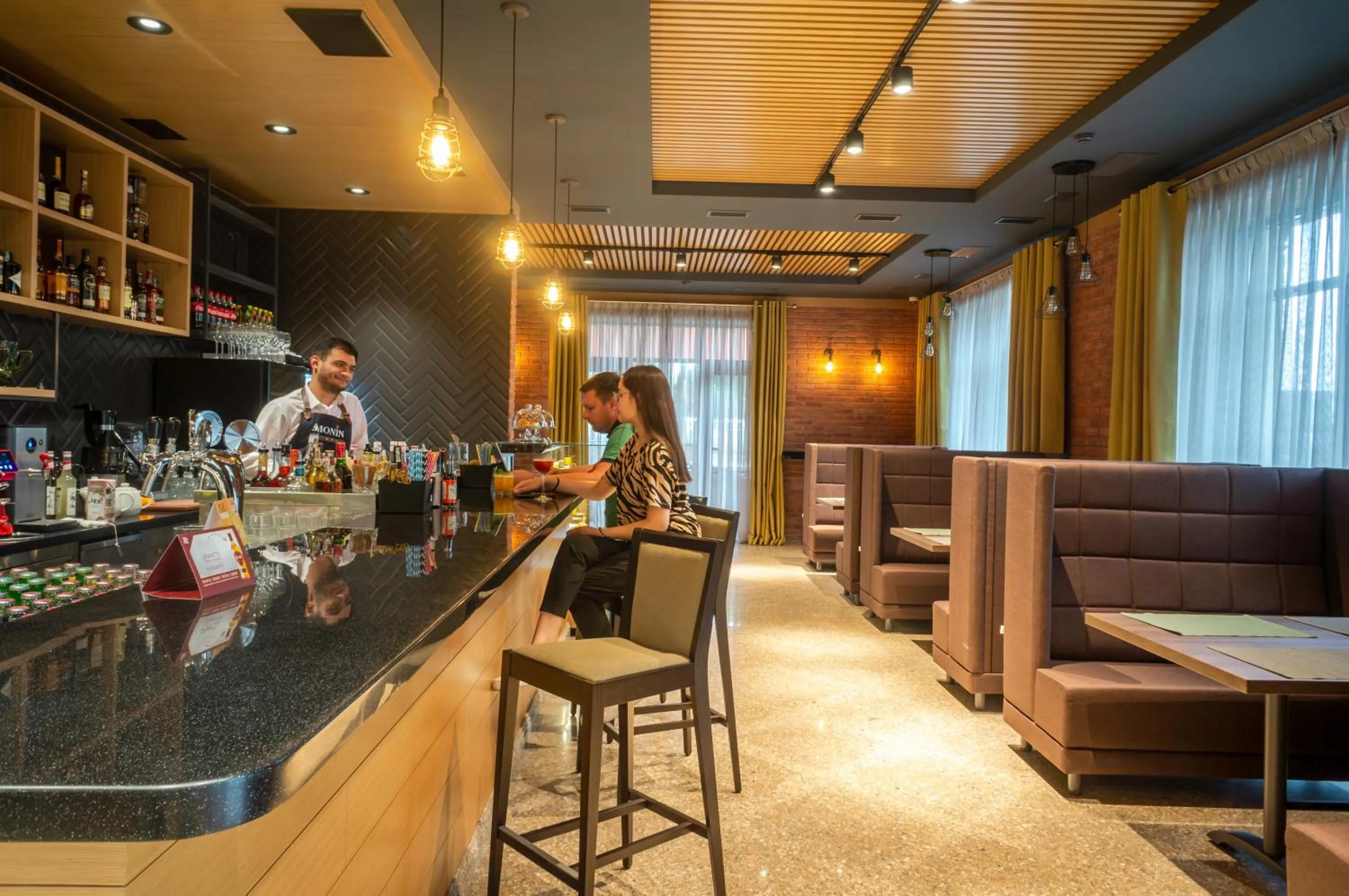 Lounge or bar in Royal Plus Hotel