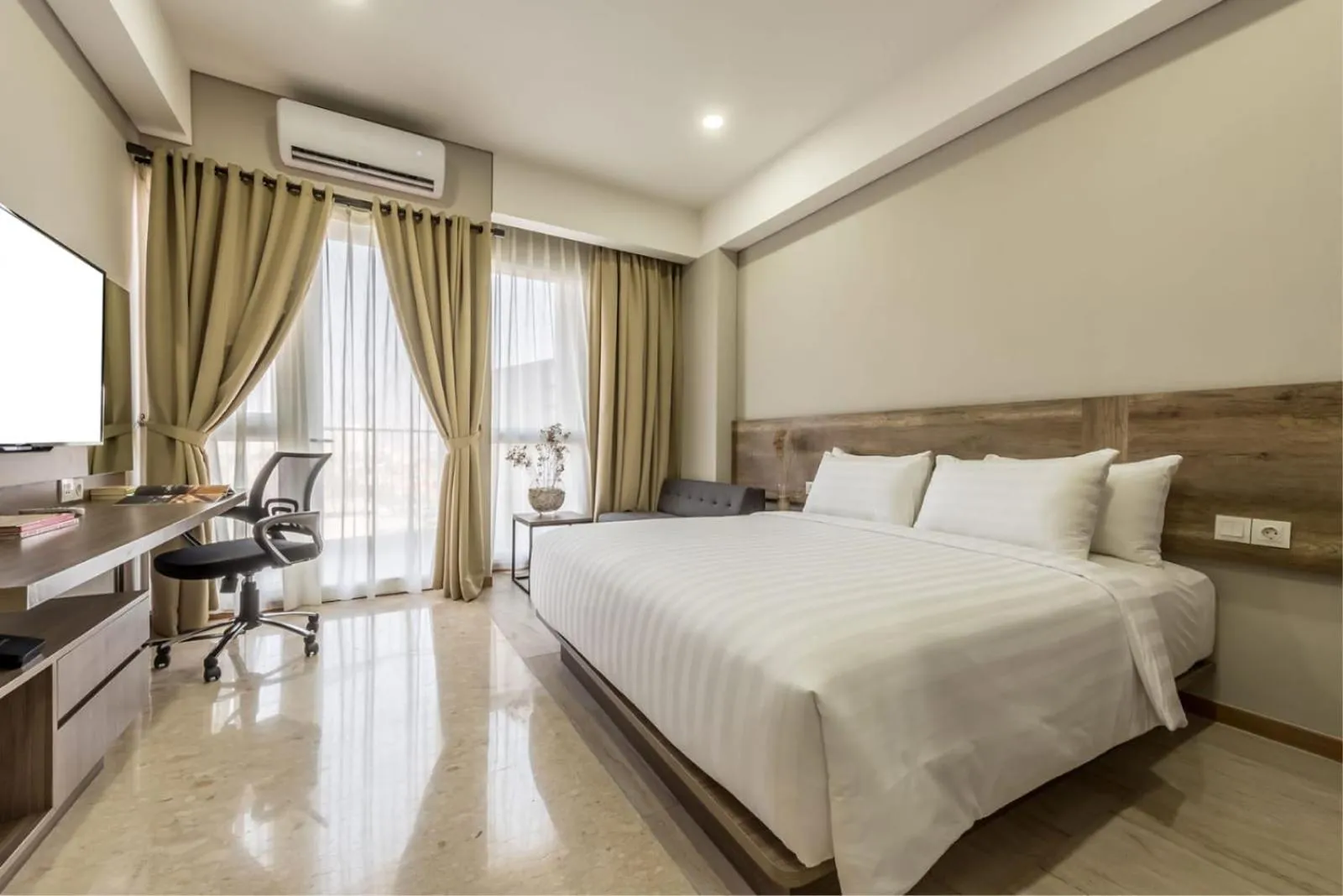 Bed in Grande Valore Hotel Cikarang