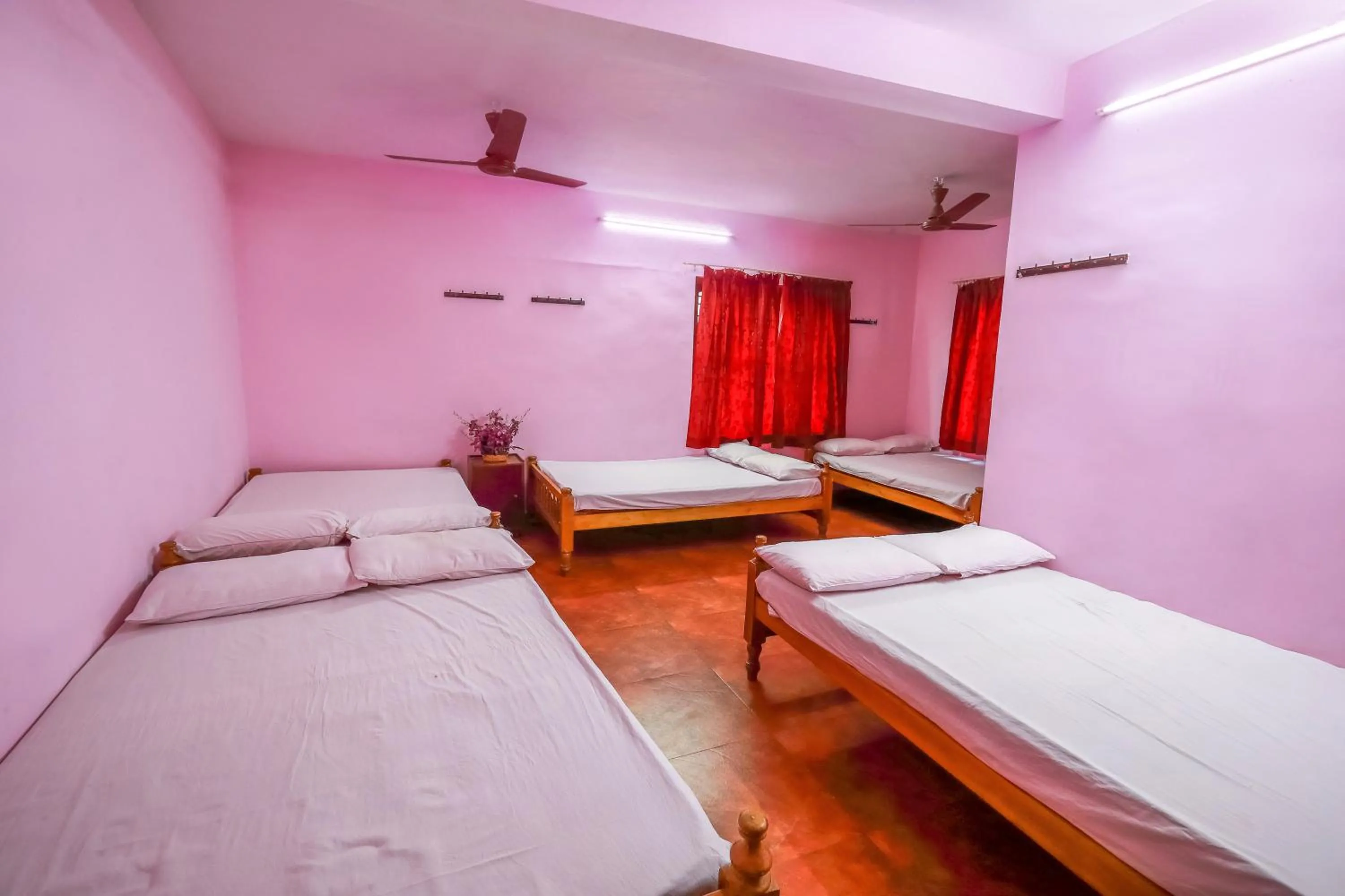 Bed in Sri Udupi Hotel