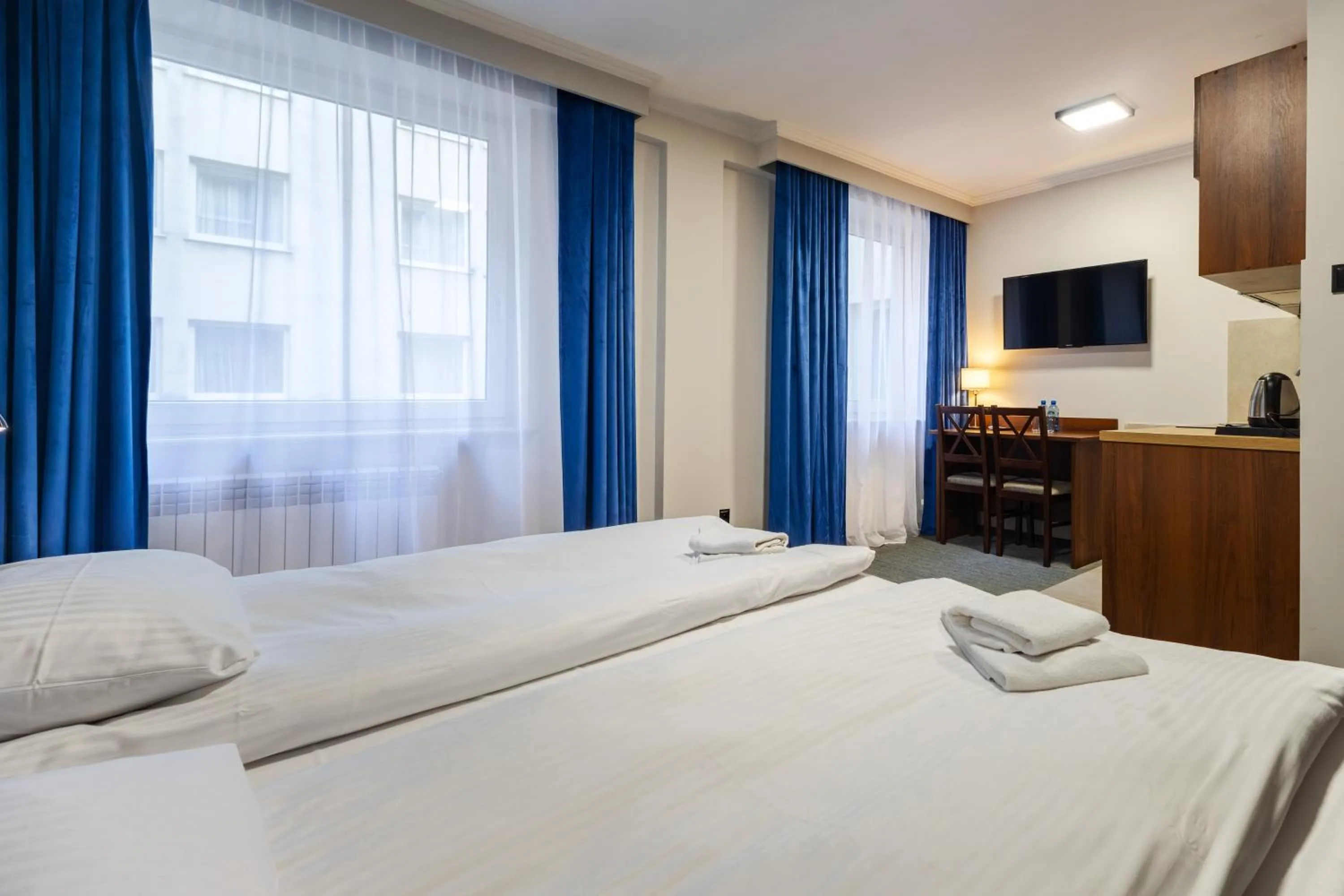 Bed in Noclegi Hit Rooms & Apartments