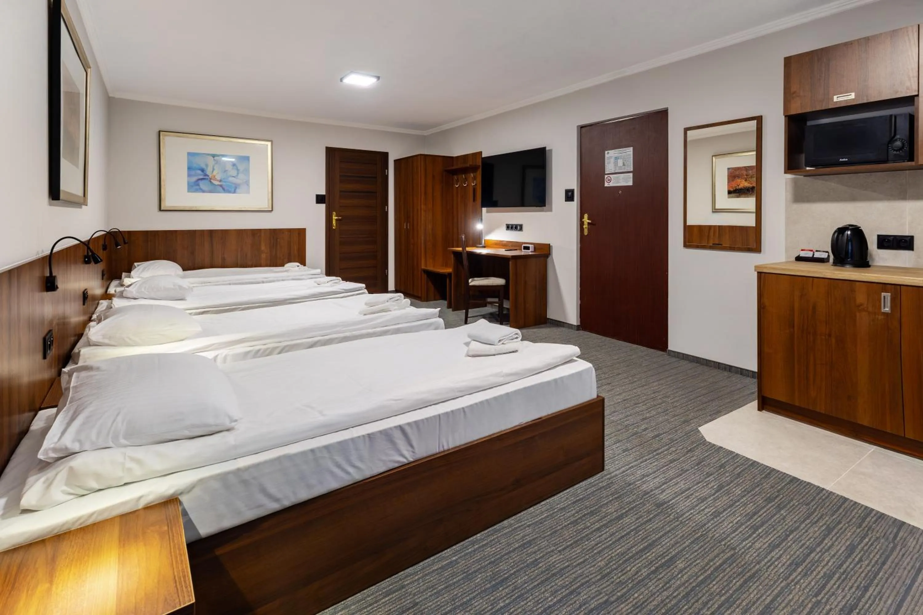 Bed in Noclegi Hit Rooms & Apartments