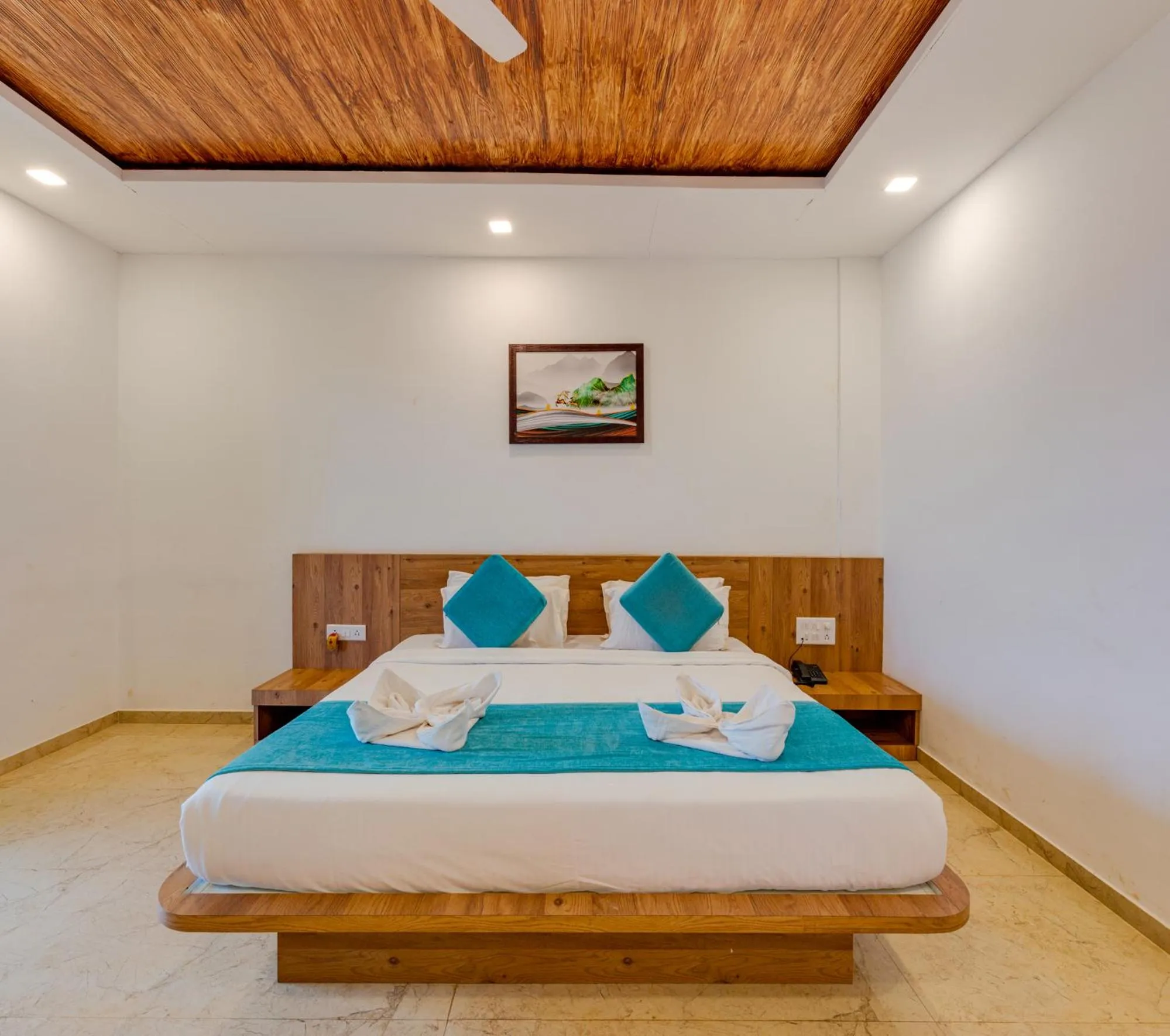 Bed in Hotel Mahabaleshwar Fragrance