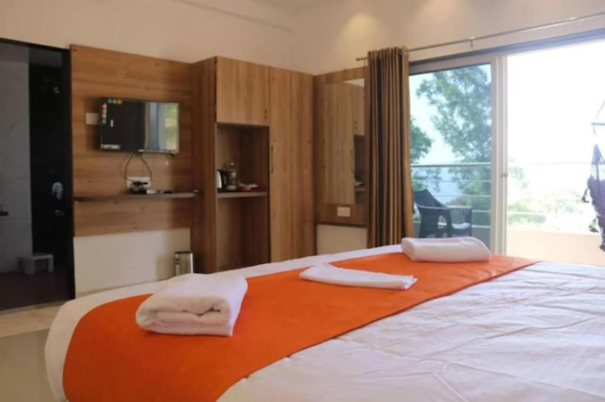 Bed in Hotel Mahabaleshwar Fragrance