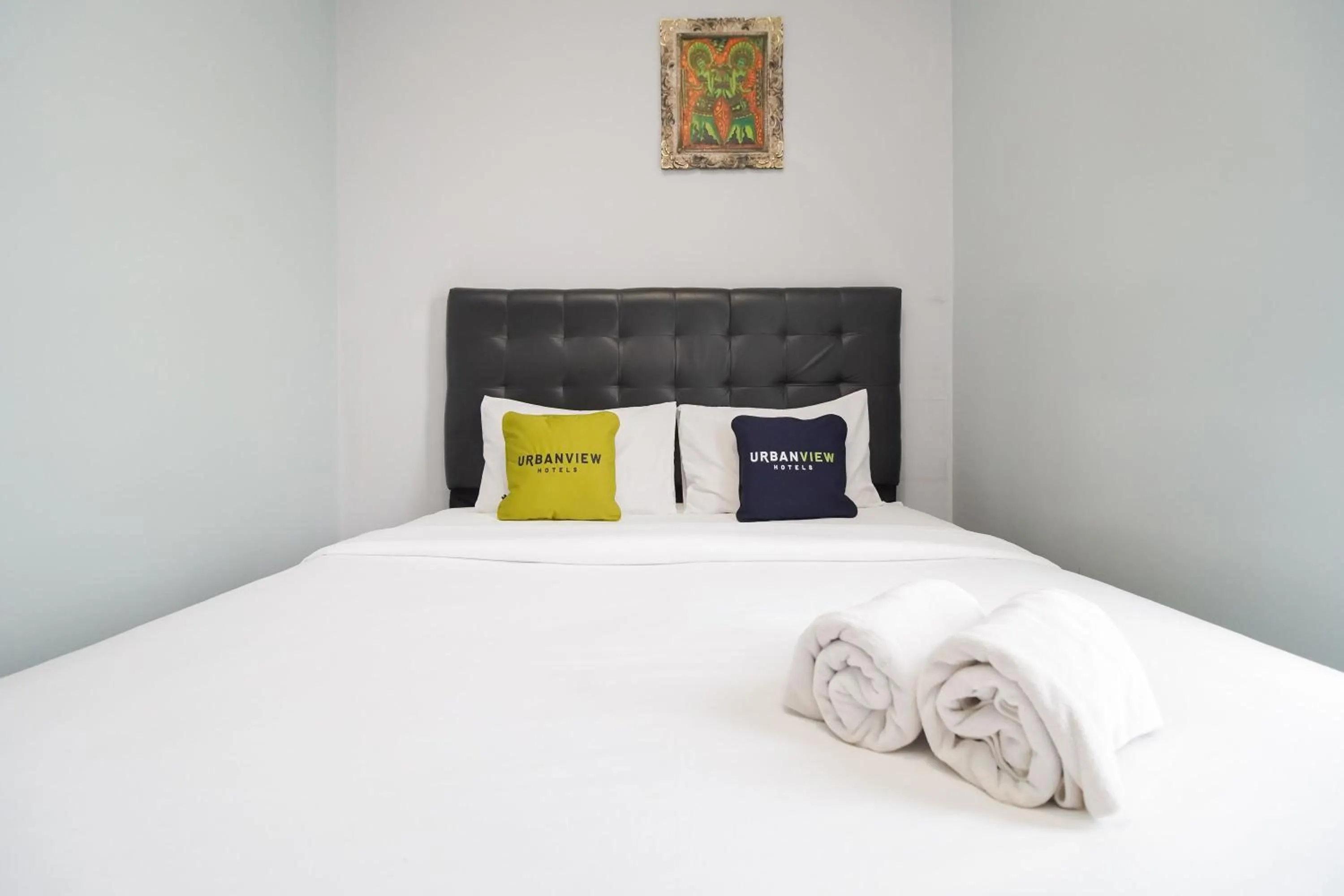 Bedroom, Bed in Urbanview Hotel Arafuru Residence Duren Sawit