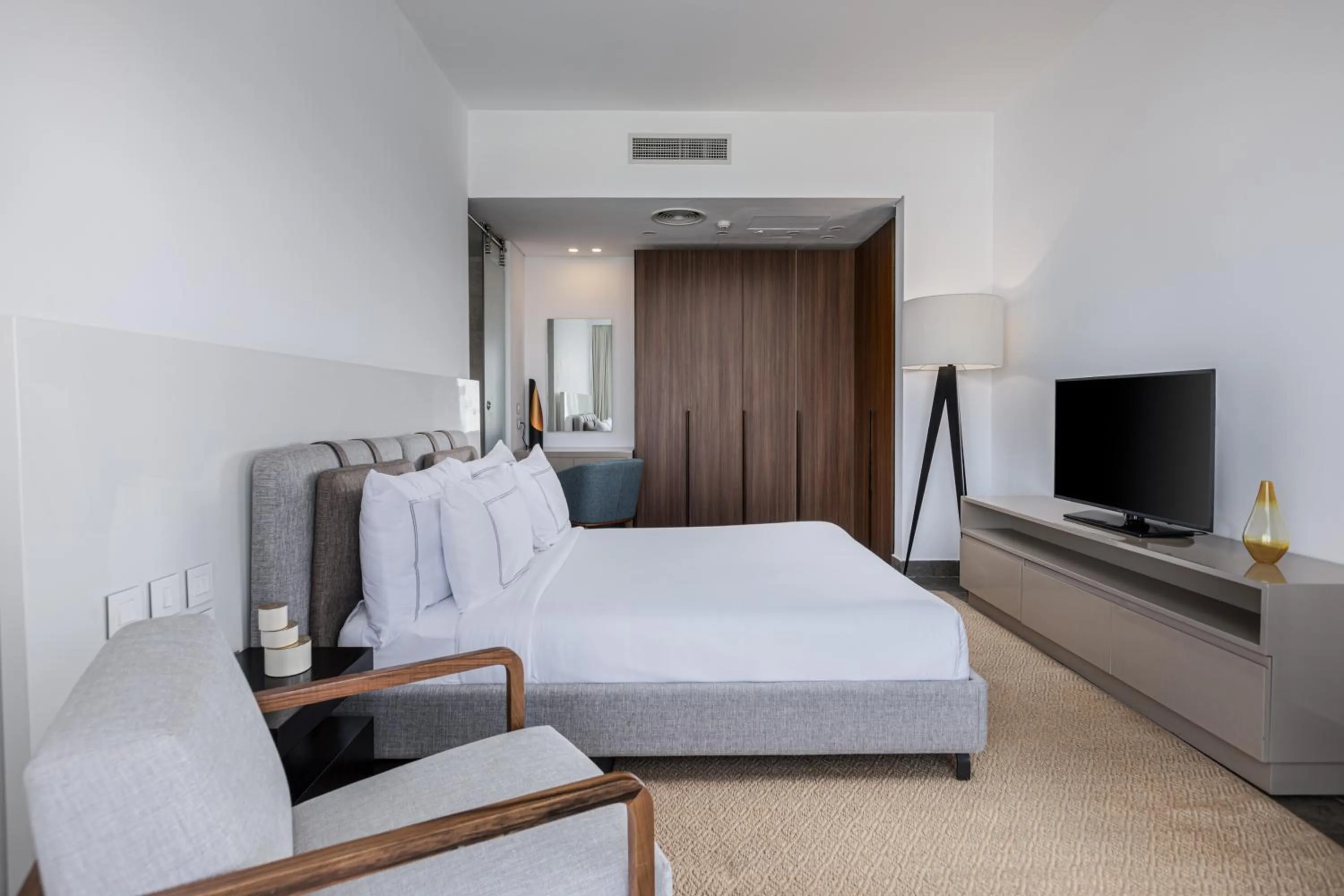 Bed in The G Hotel Seashell