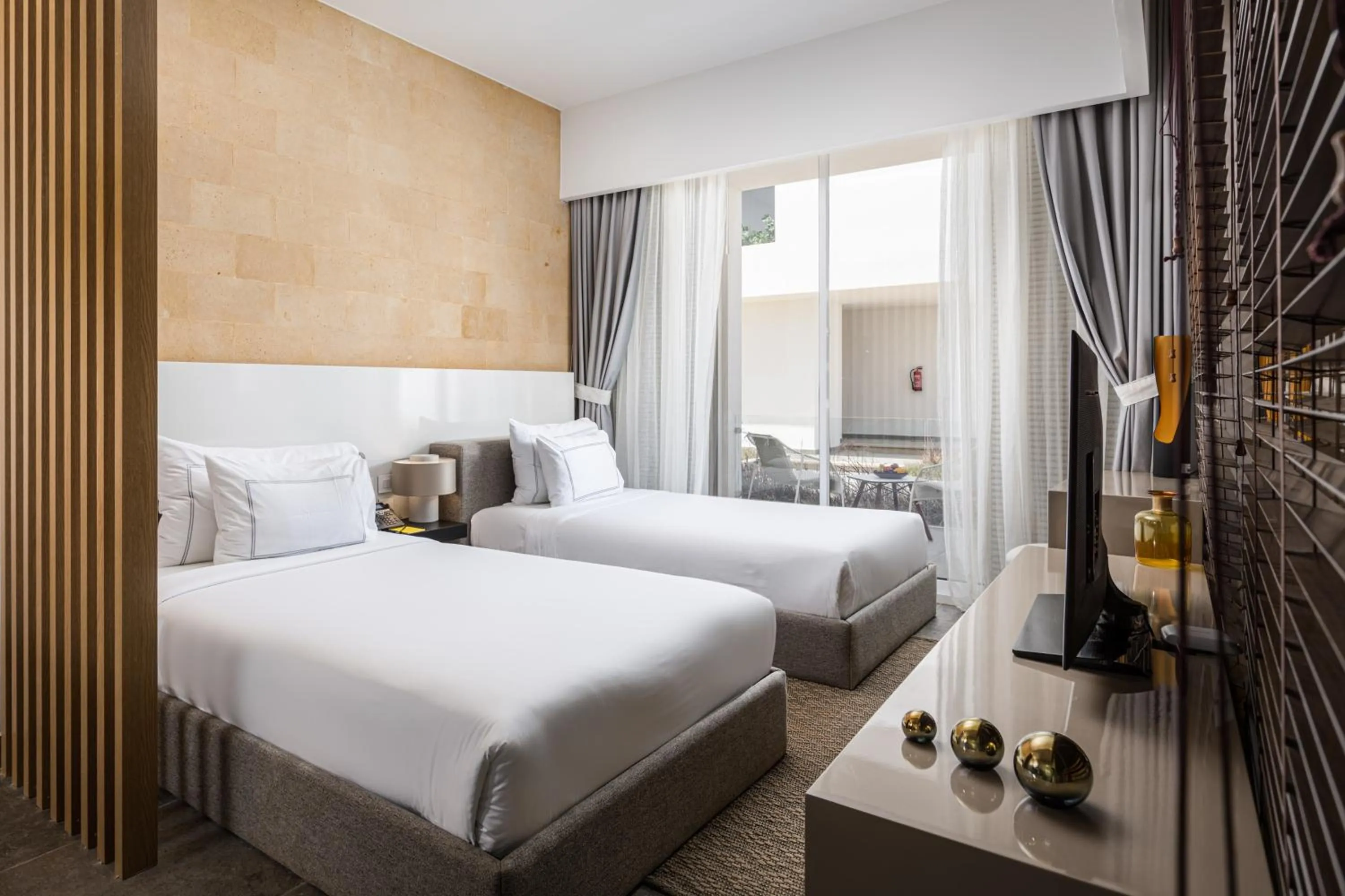 Bed in The G Hotel Seashell