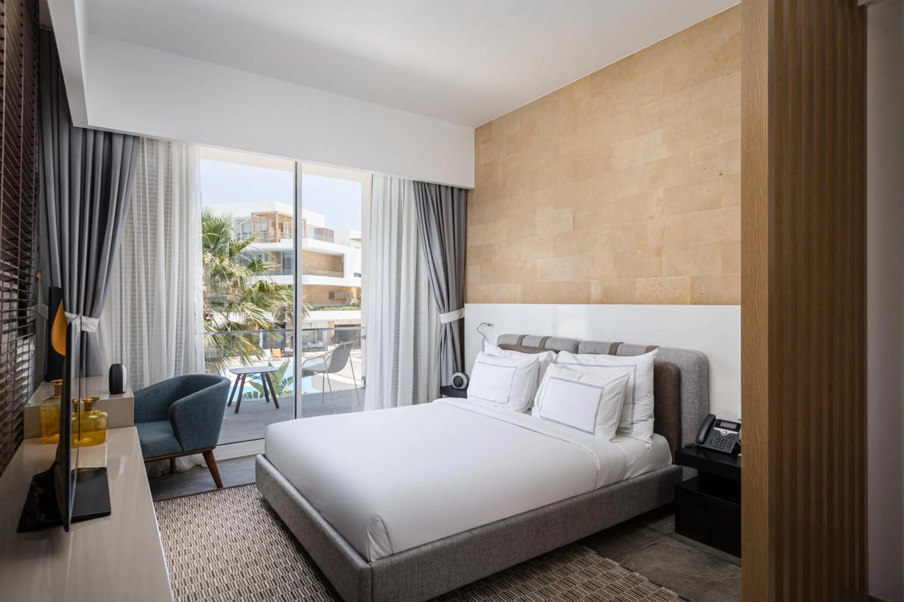 Bed in The G Hotel Seashell