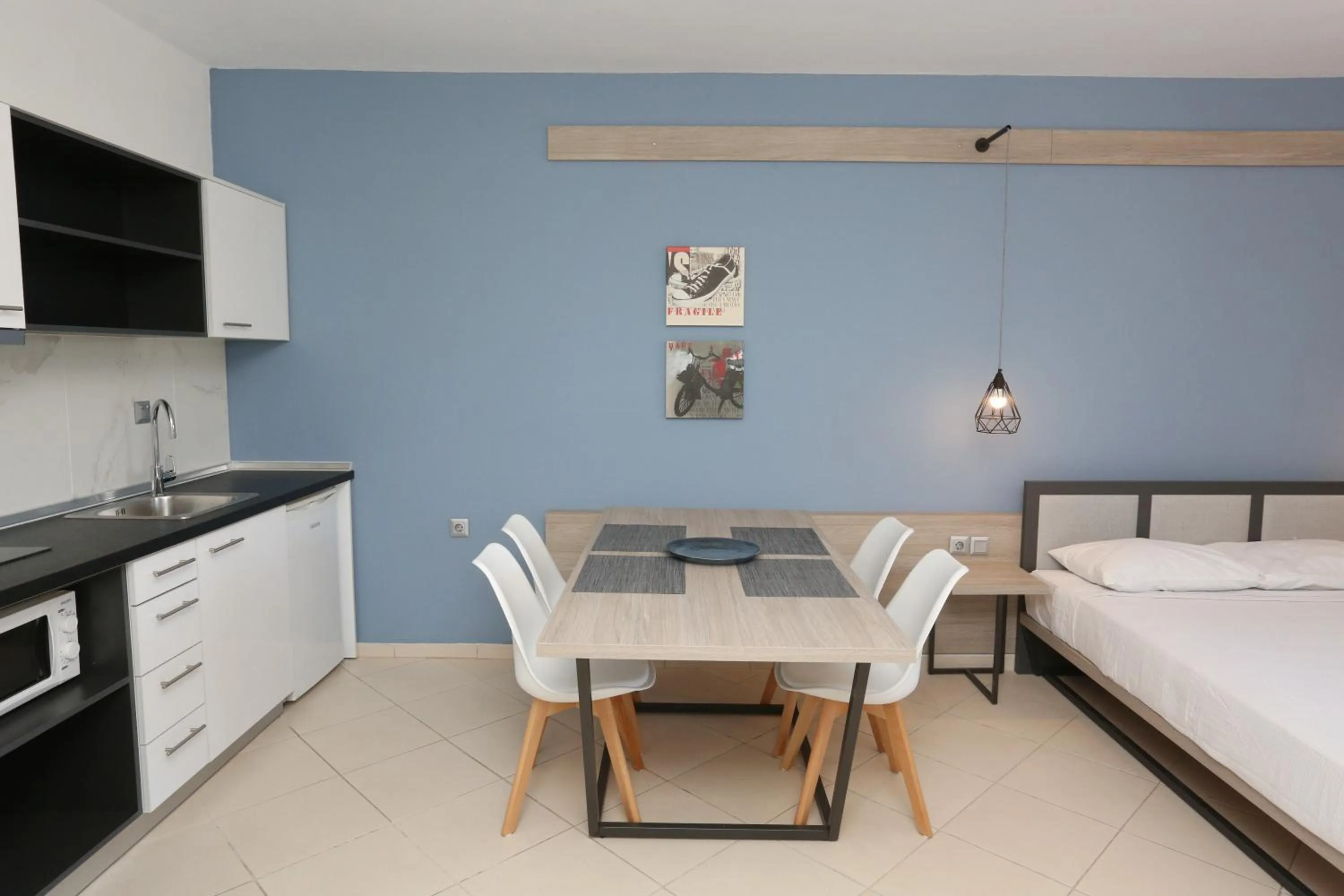 Dining area, Bed in Agreste Luxury Apartments
