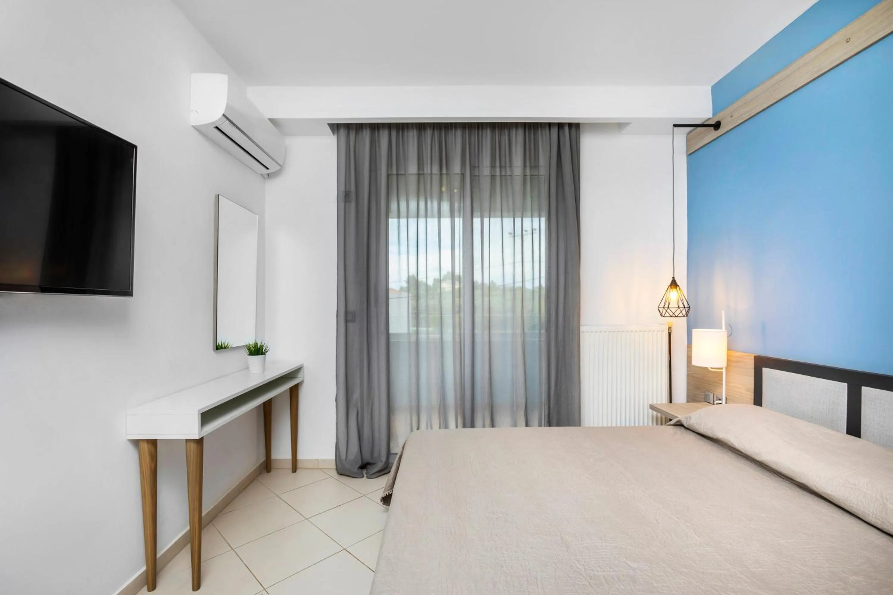 Bed in Agreste Luxury Apartments