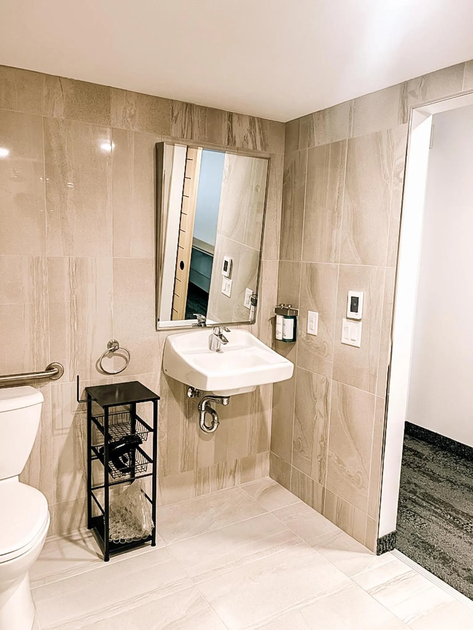 Bathroom in La Place Rendez-Vous Hotel