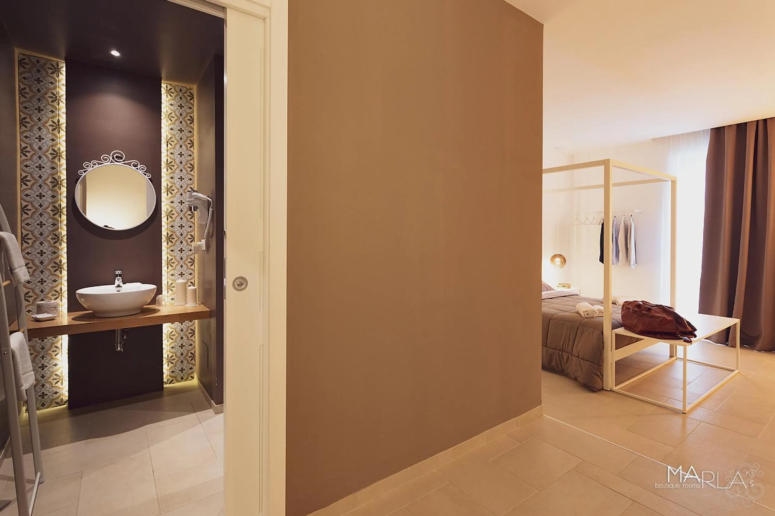 Bed in Marla's boutique rooms