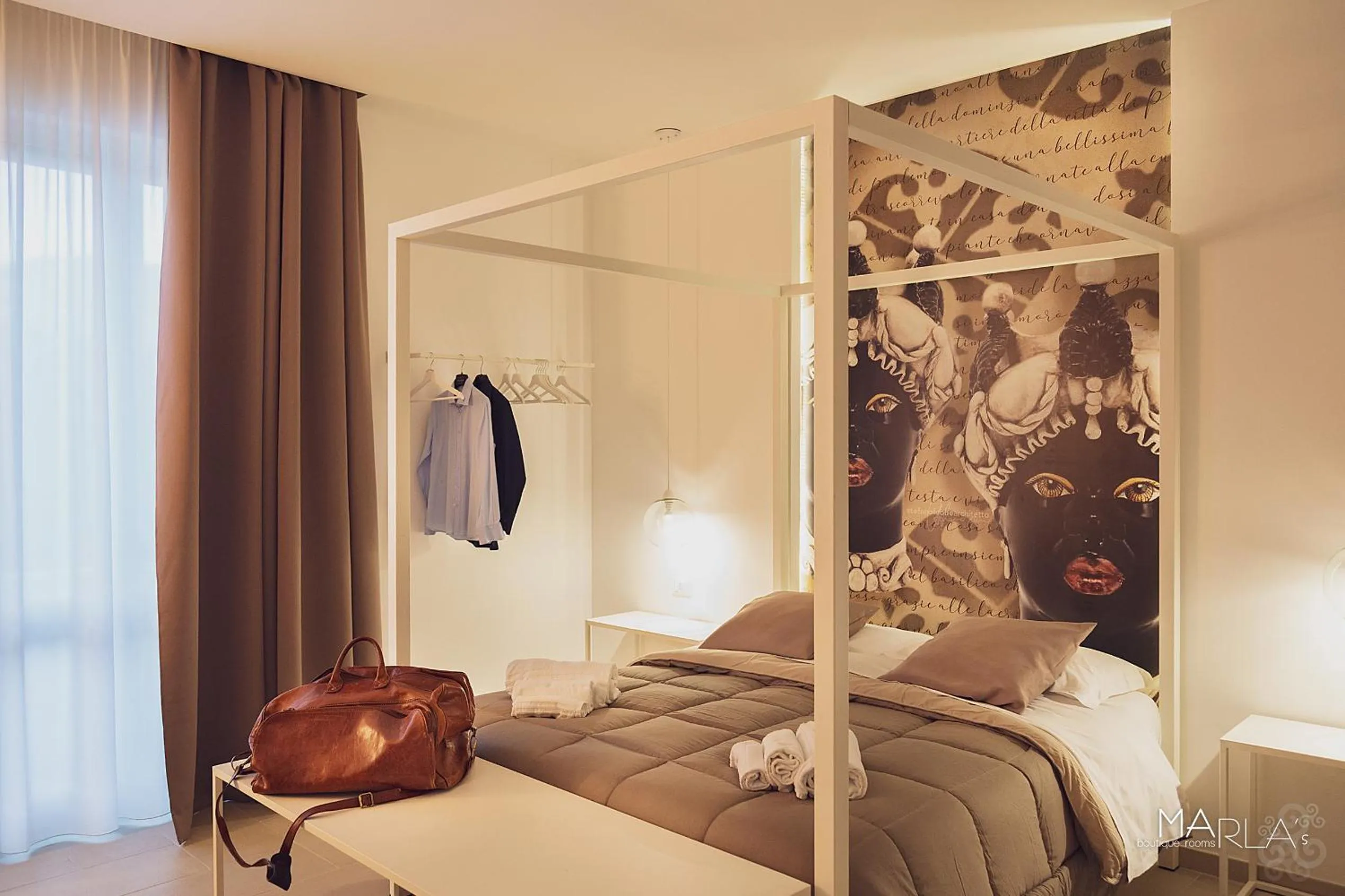 Bedroom, Bed in Marla's boutique rooms