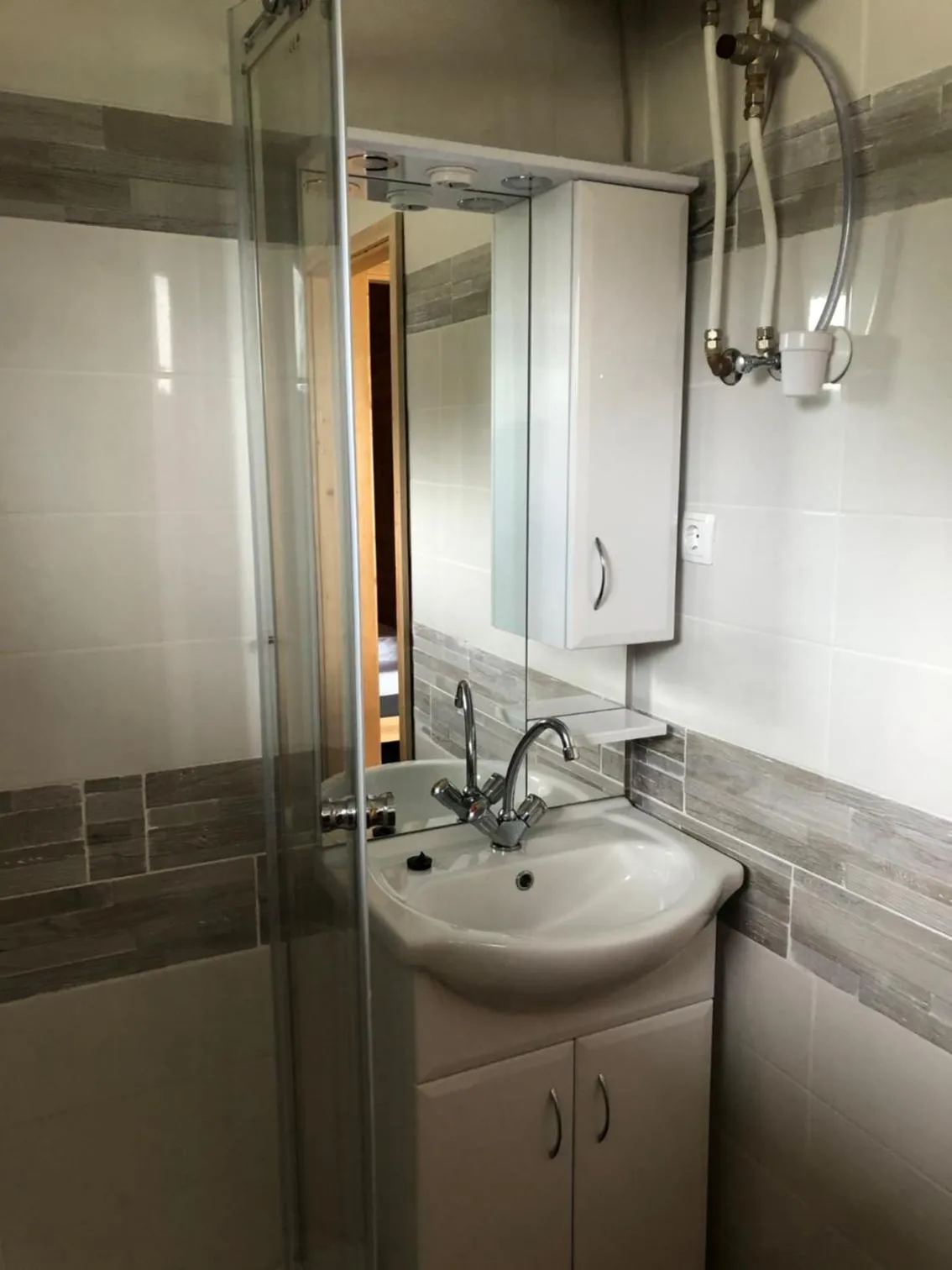 Bathroom in Napsugár Club és Panzió