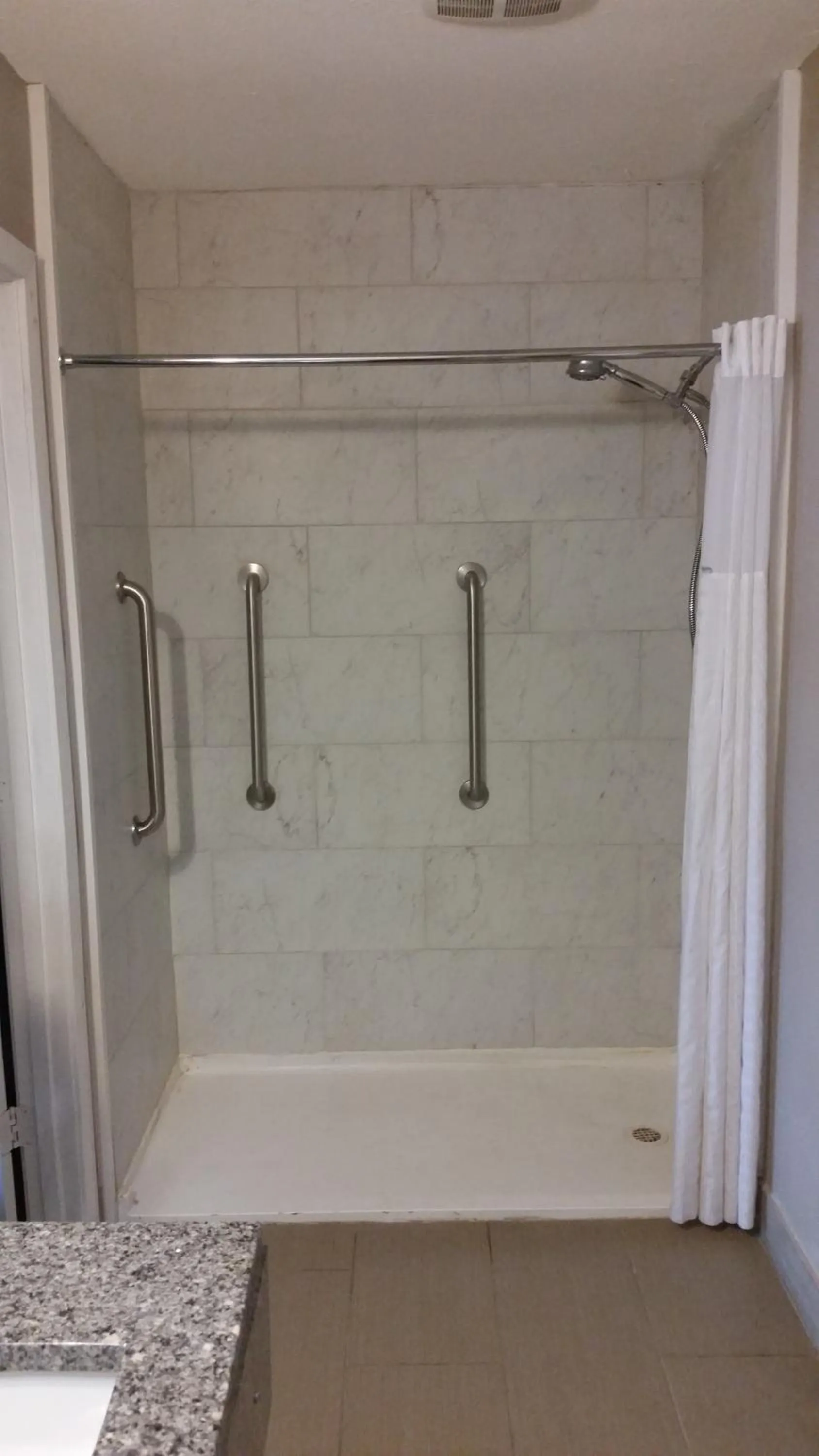 Bathroom in Super 8 by Wyndham Opelousas