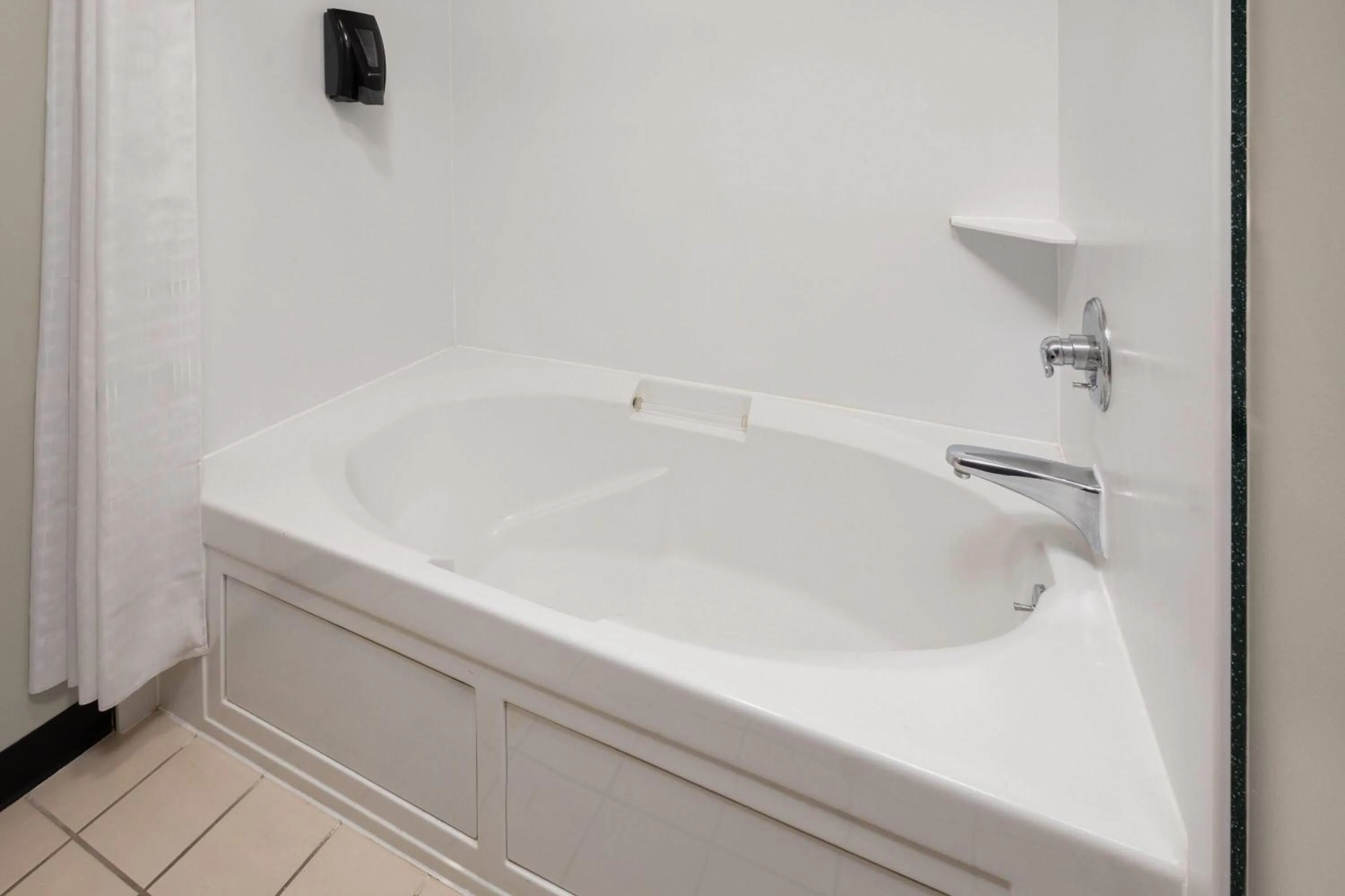 Bathroom in Days Inn by Wyndham Bad Axe