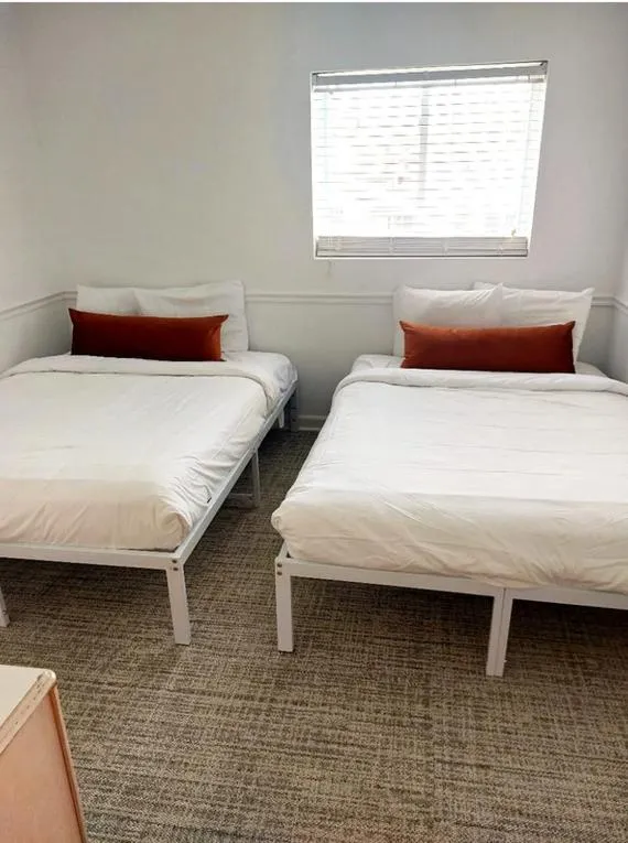 Bed in Coliseum Ocean Resort