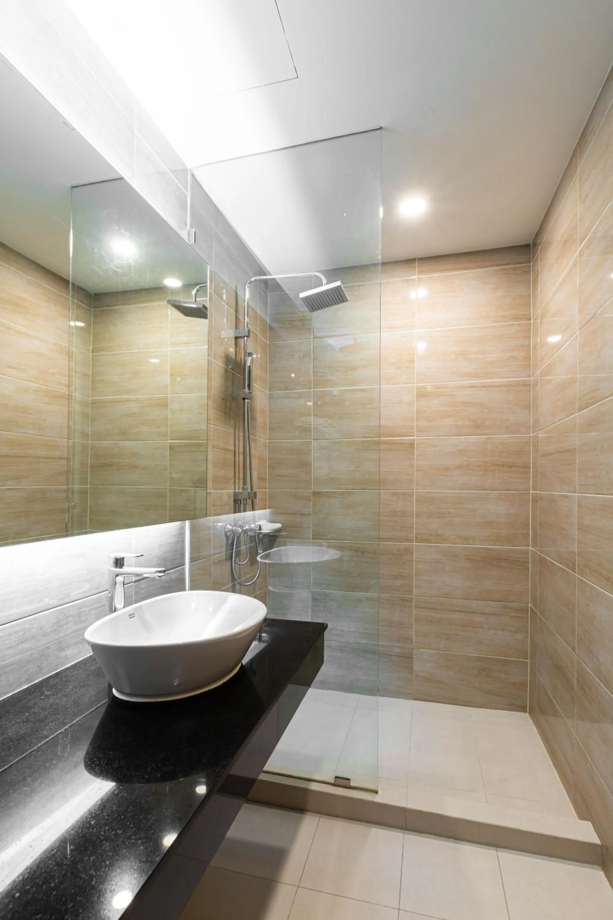 Bathroom in Leela Orchid Hotel