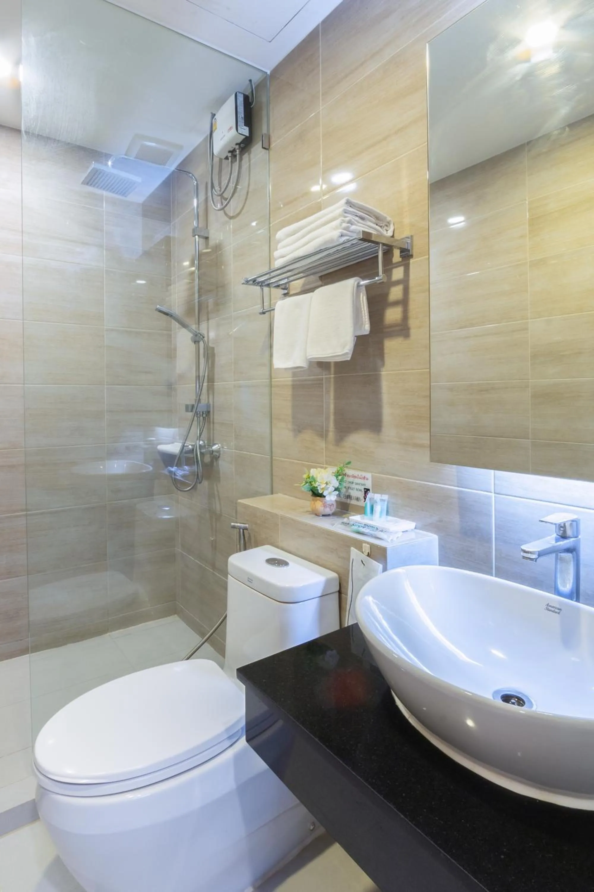 Bathroom in Leela Orchid Hotel