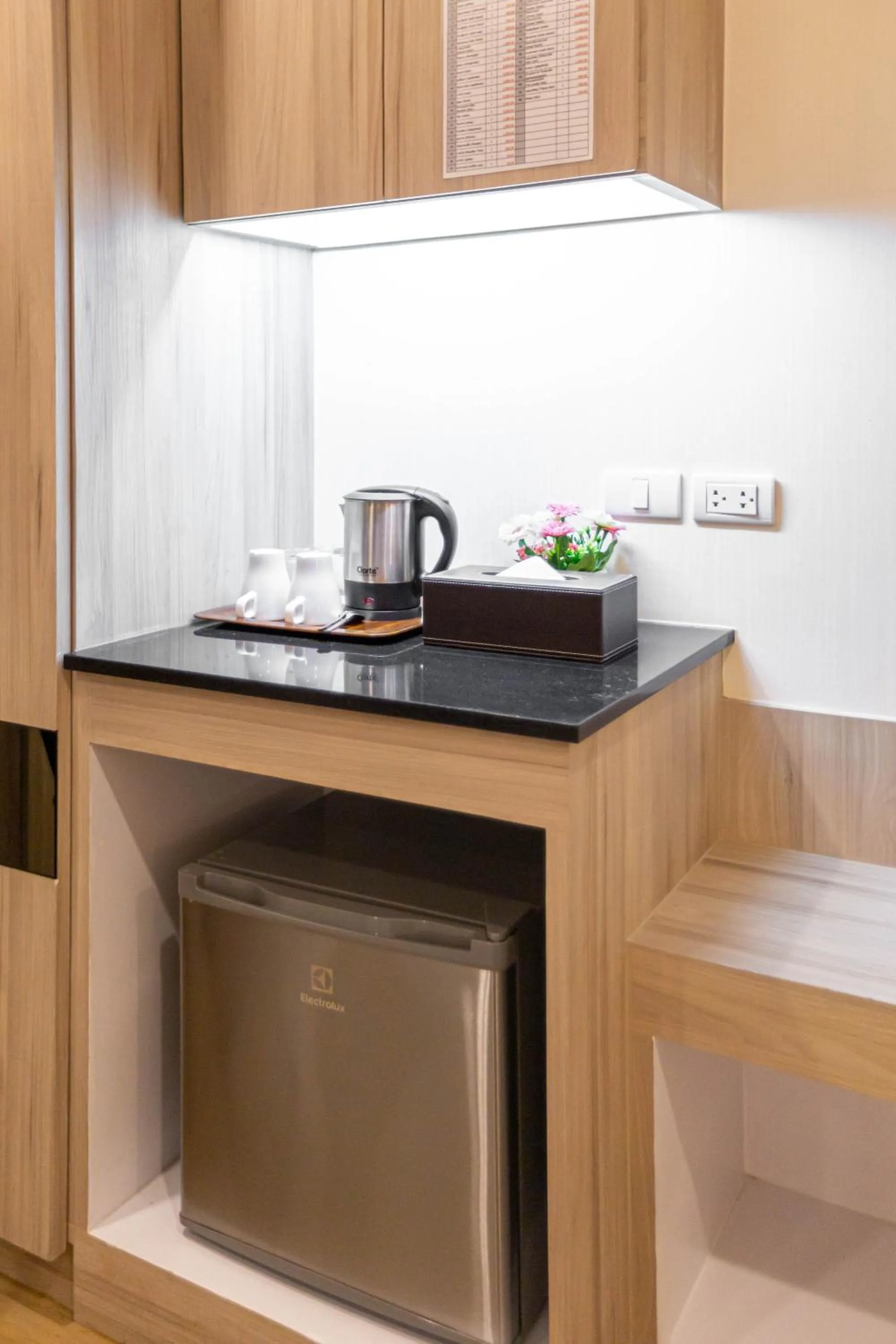 minibar in Leela Orchid Hotel