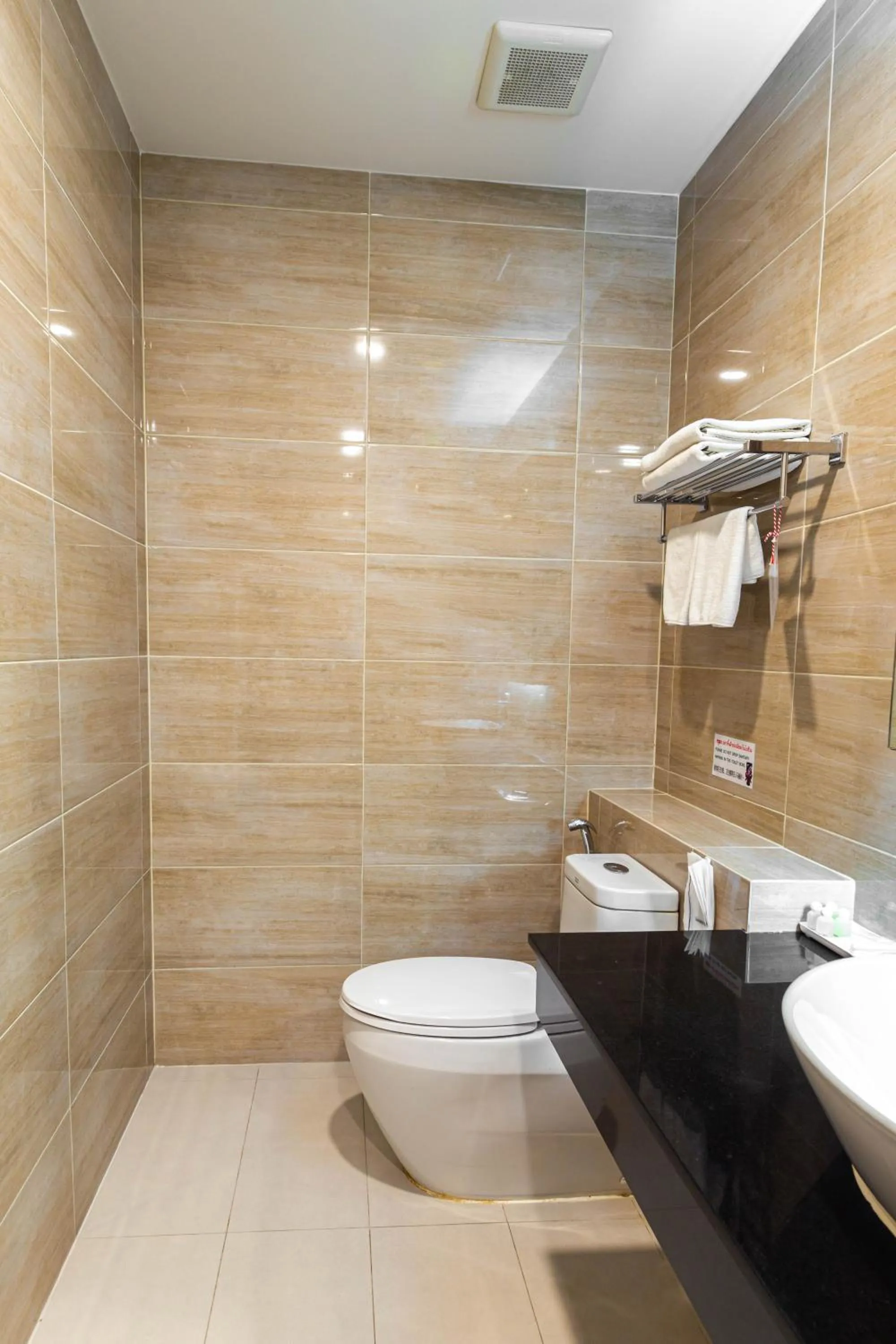 Bathroom in Leela Orchid Hotel