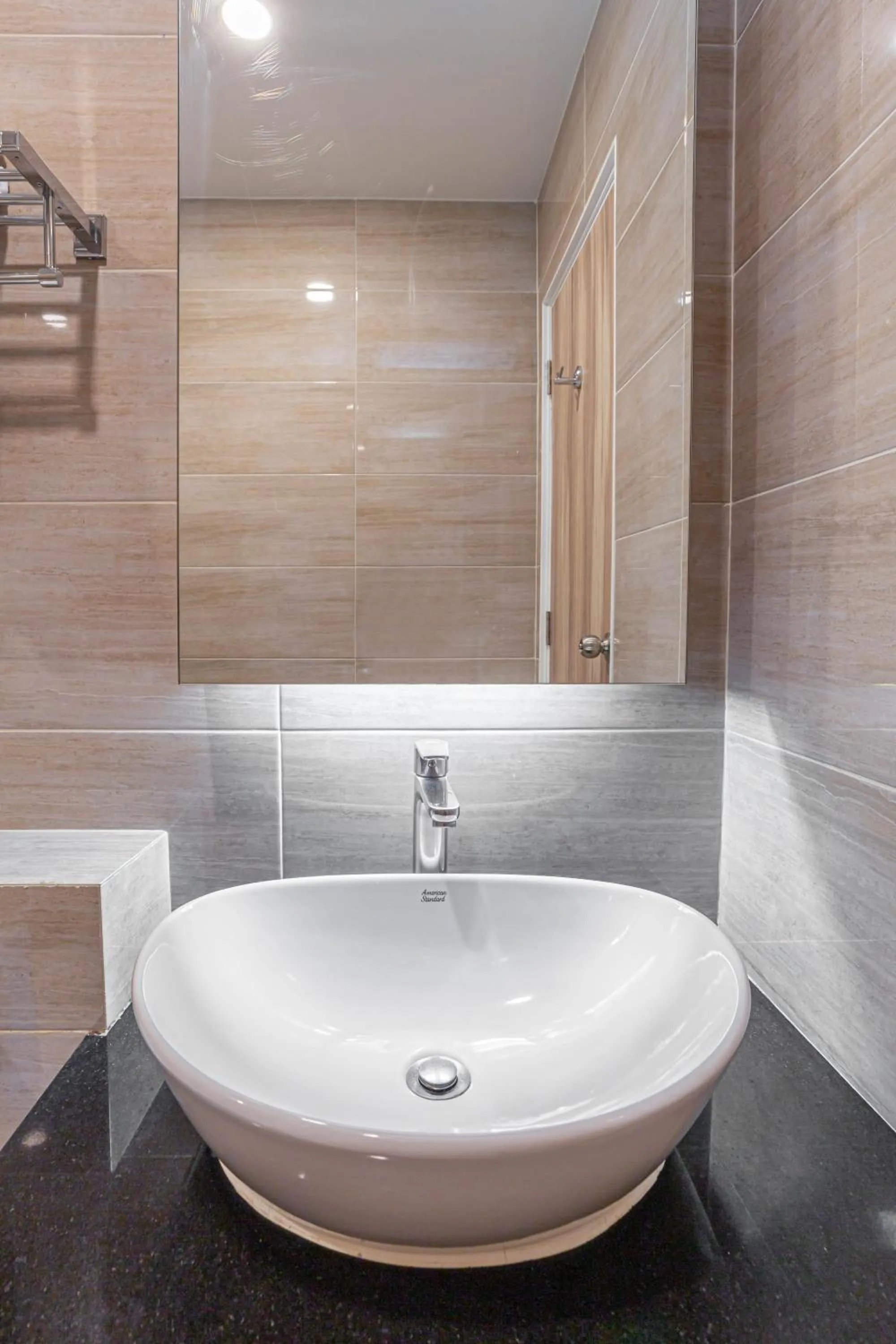 Bathroom in Leela Orchid Hotel