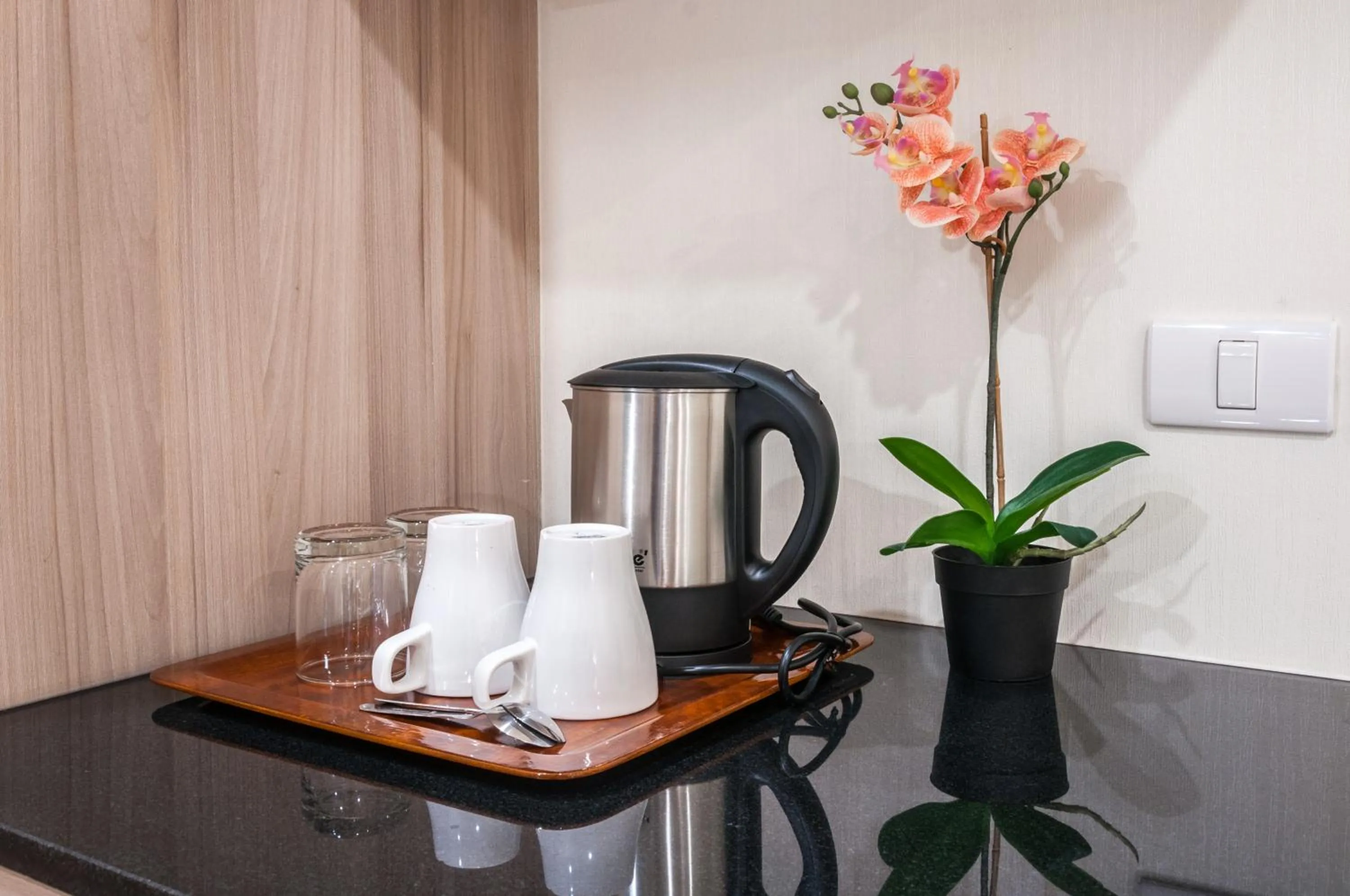 Coffee/tea facilities in Leela Orchid Hotel