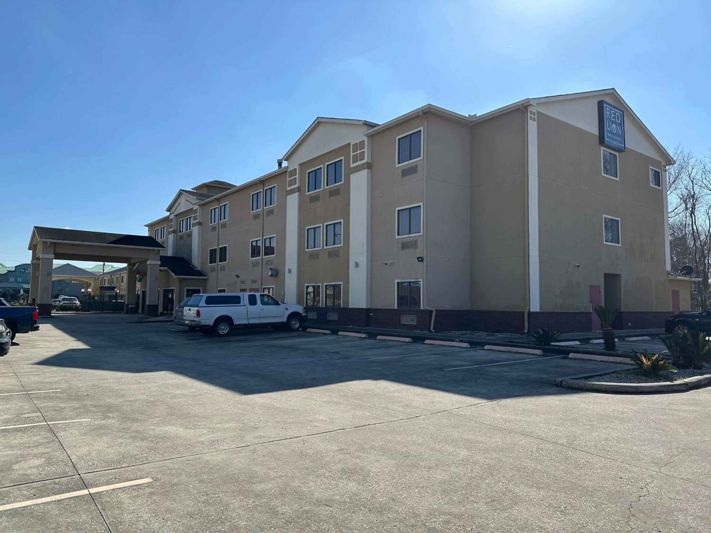 Property building in Super 8 by Wyndham Intercontinental Houston TX