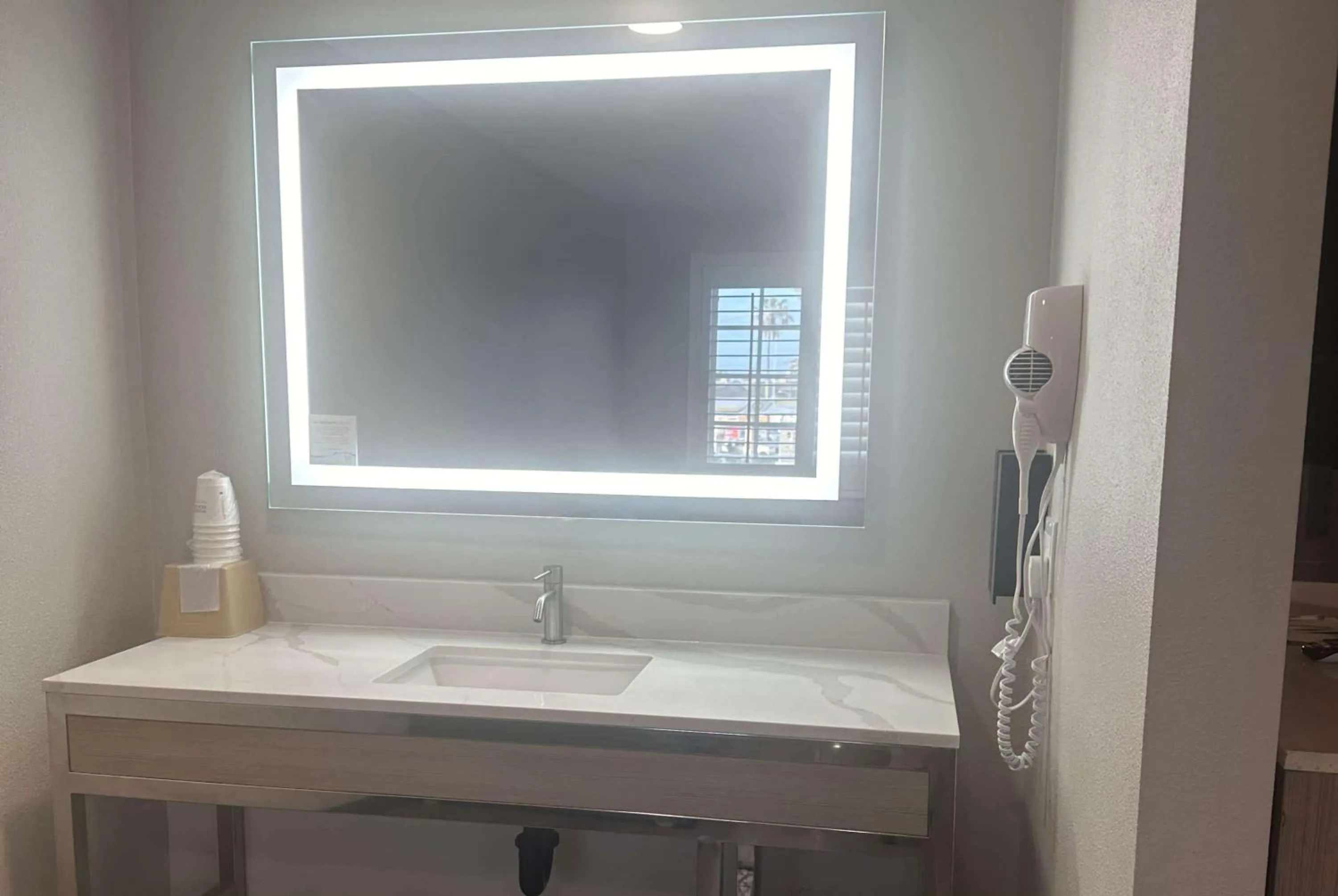 Bathroom in Super 8 by Wyndham Oceanside Downtown