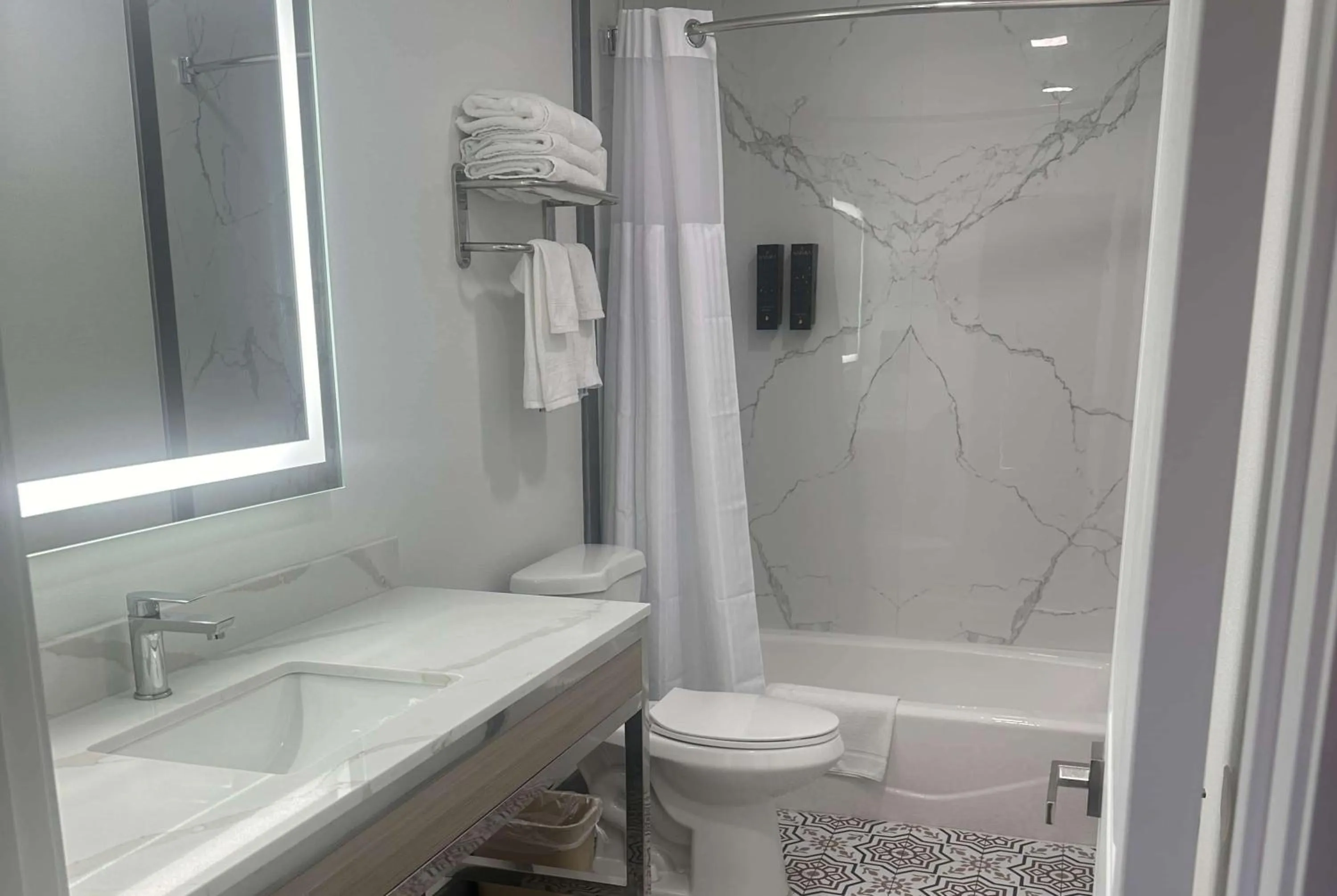 Bathroom in Super 8 by Wyndham Oceanside Downtown