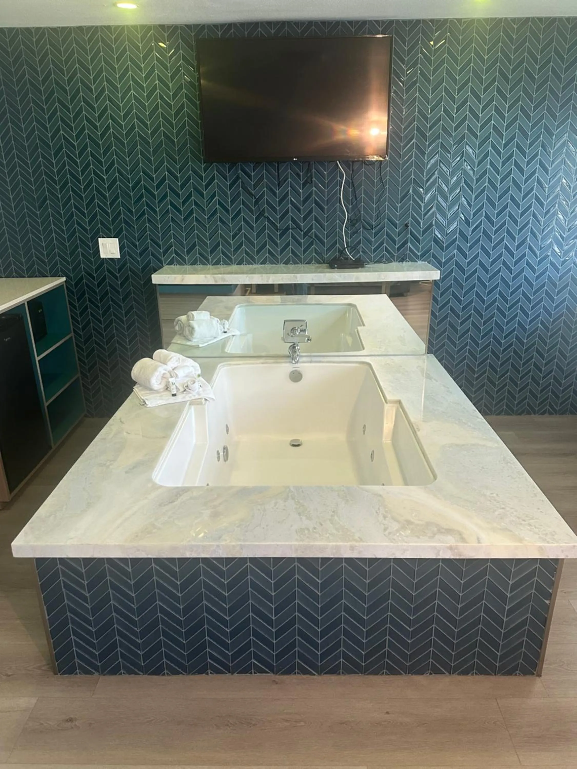 Bathroom in Super 8 by Wyndham Oceanside Downtown