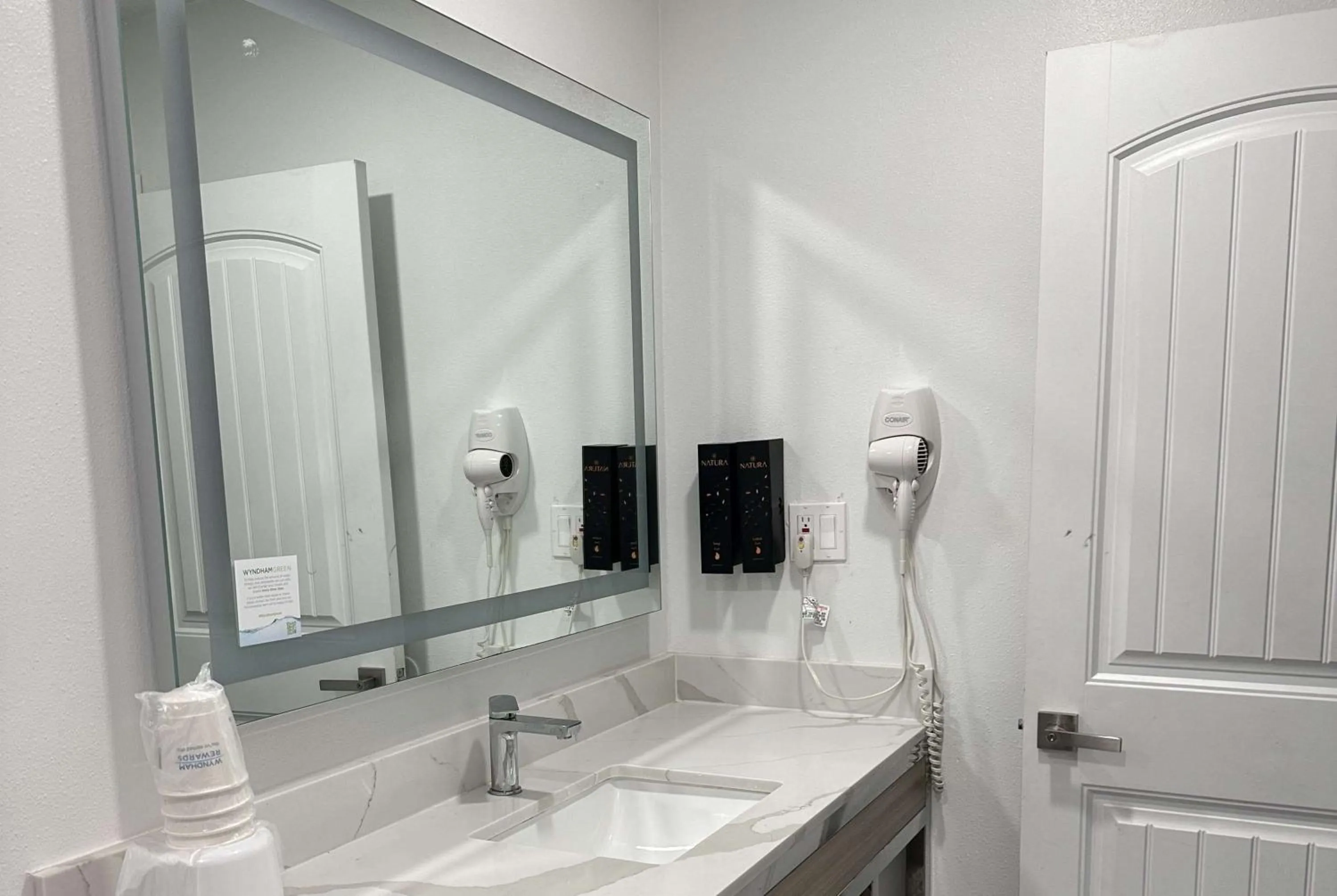 Bathroom in Super 8 by Wyndham Oceanside Downtown