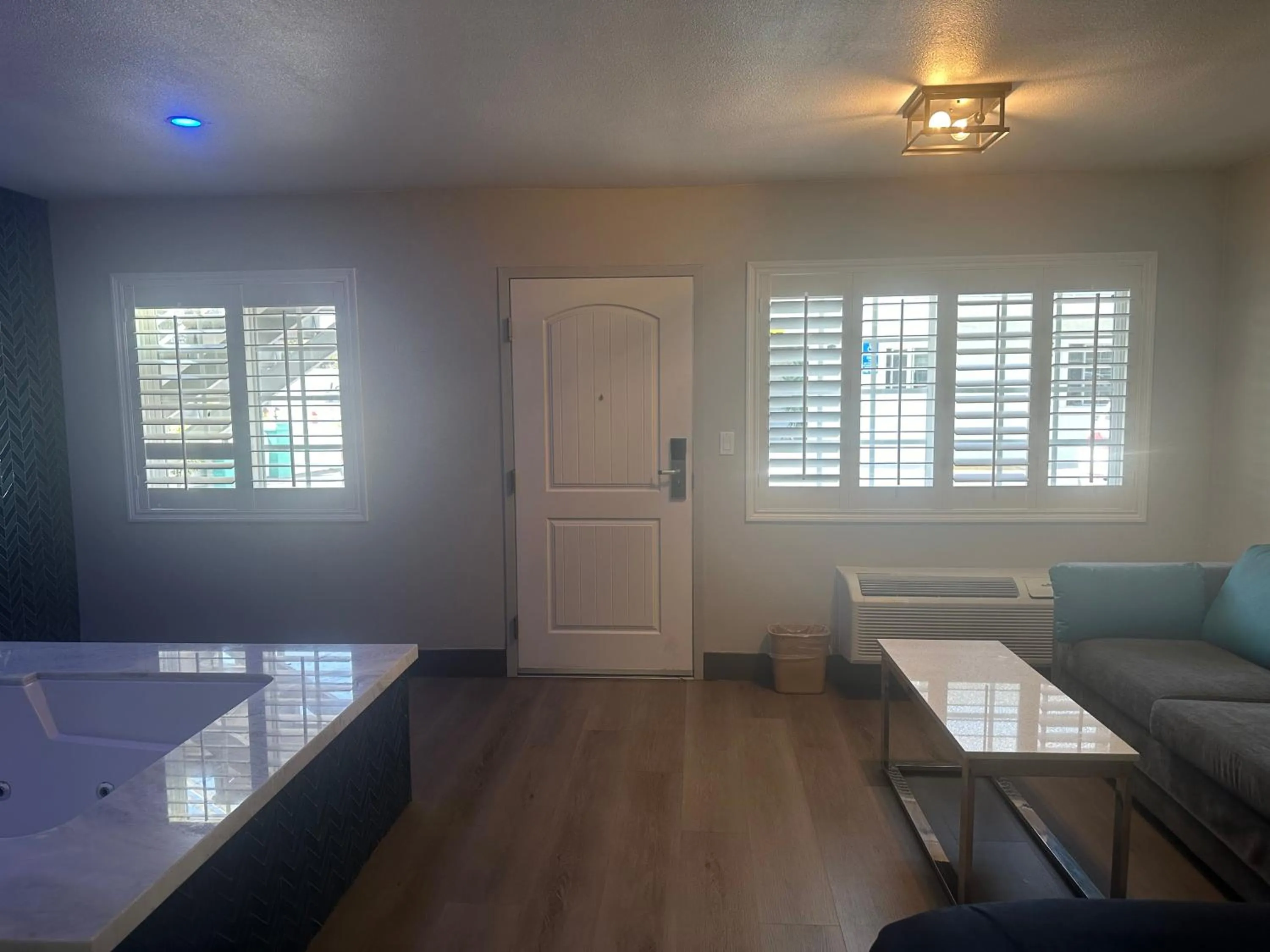 Living room, Bed in Super 8 by Wyndham Oceanside Downtown