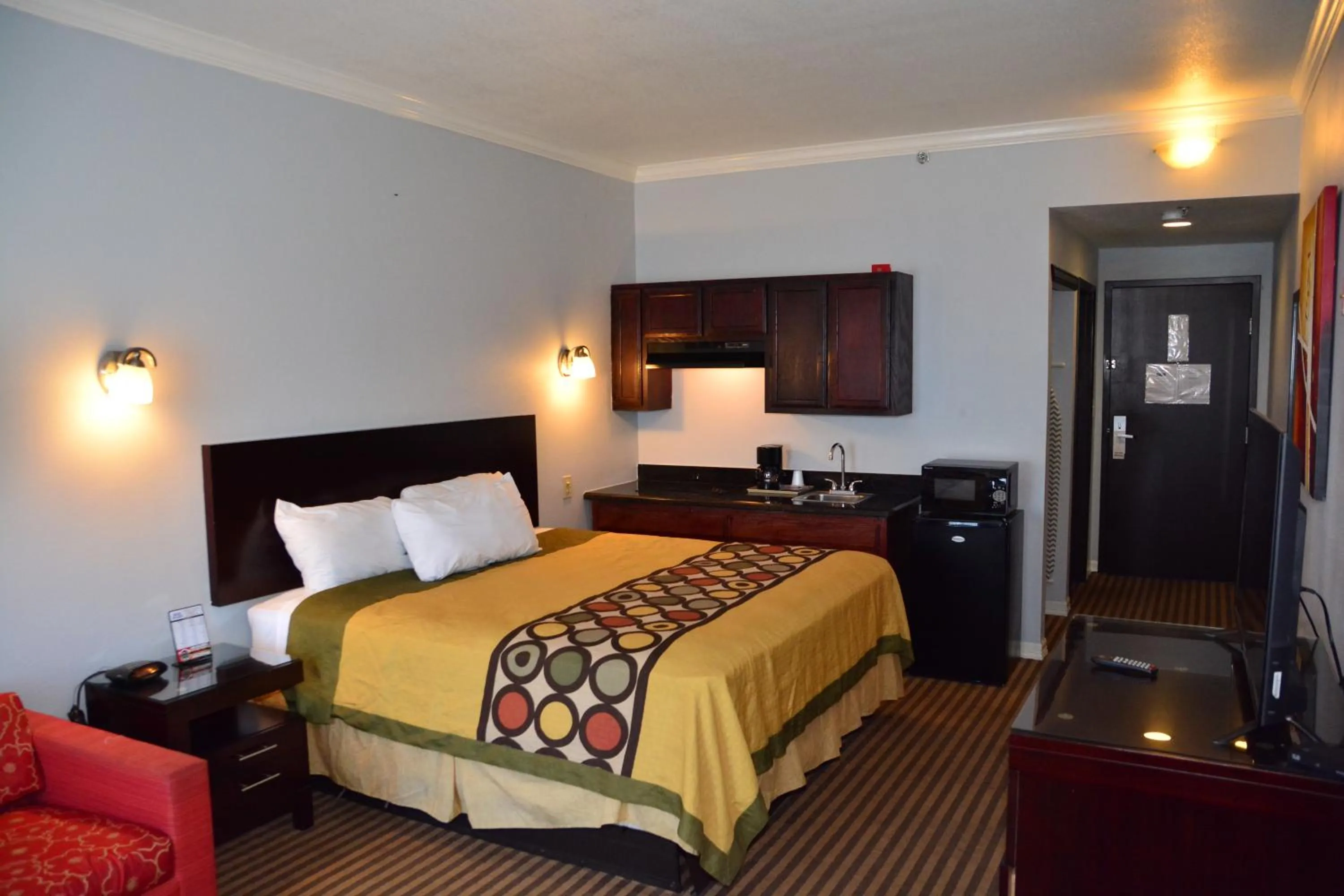 Bed in Blue Bay Inn and Suites